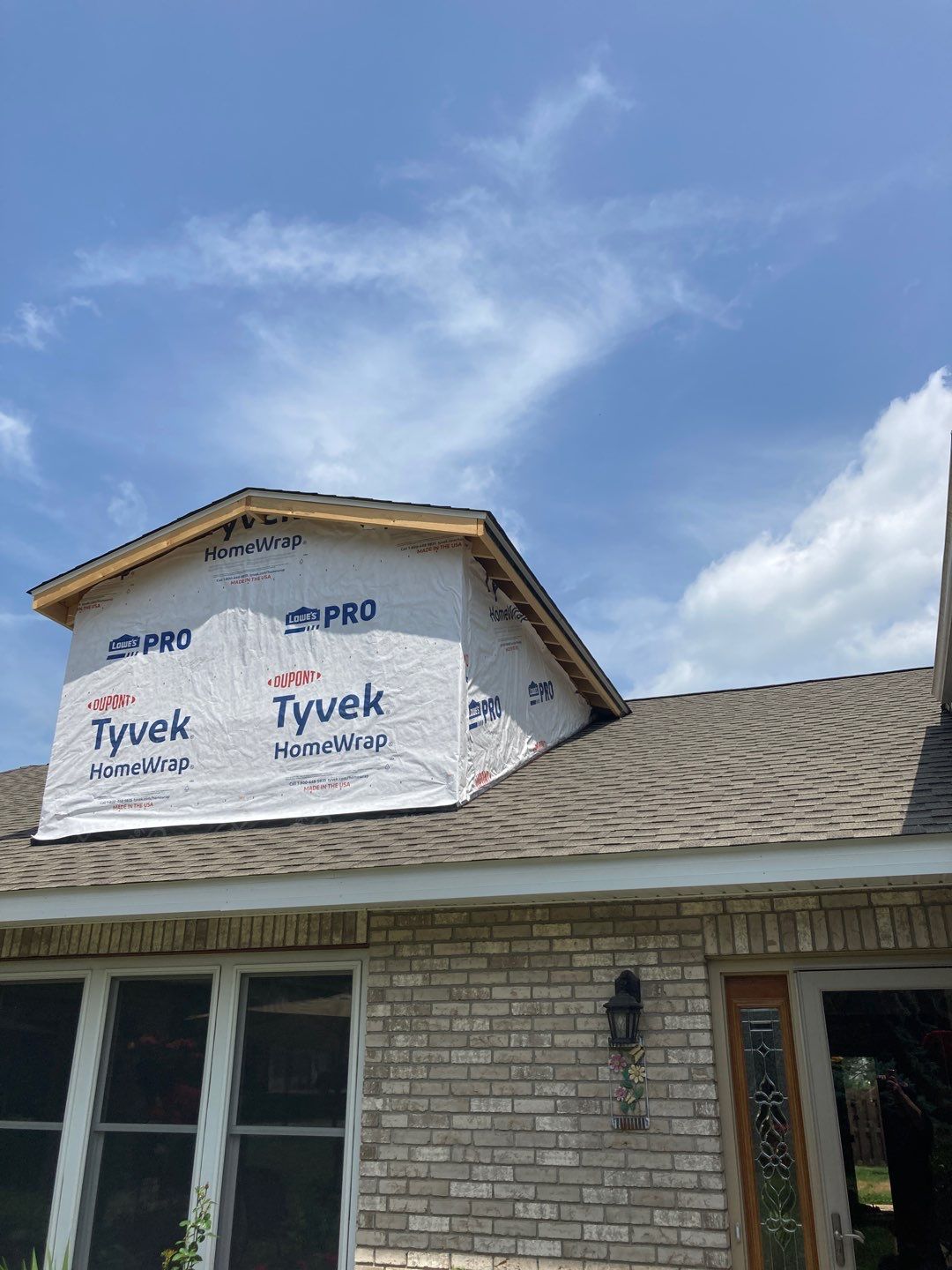 Gutter Installation using 5" Seamless Aluminum Gutters by Absolute Roofing and Construction