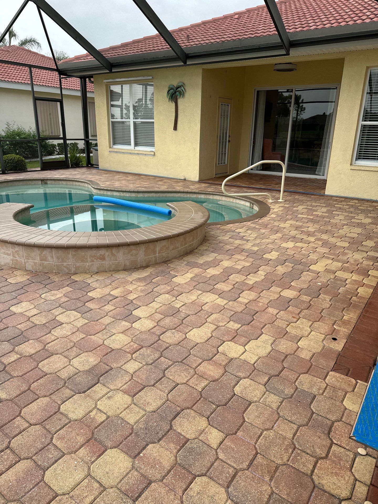 Paver Cleaning and Sealing pool deck in Sun City Center by Supreme Paver Experts