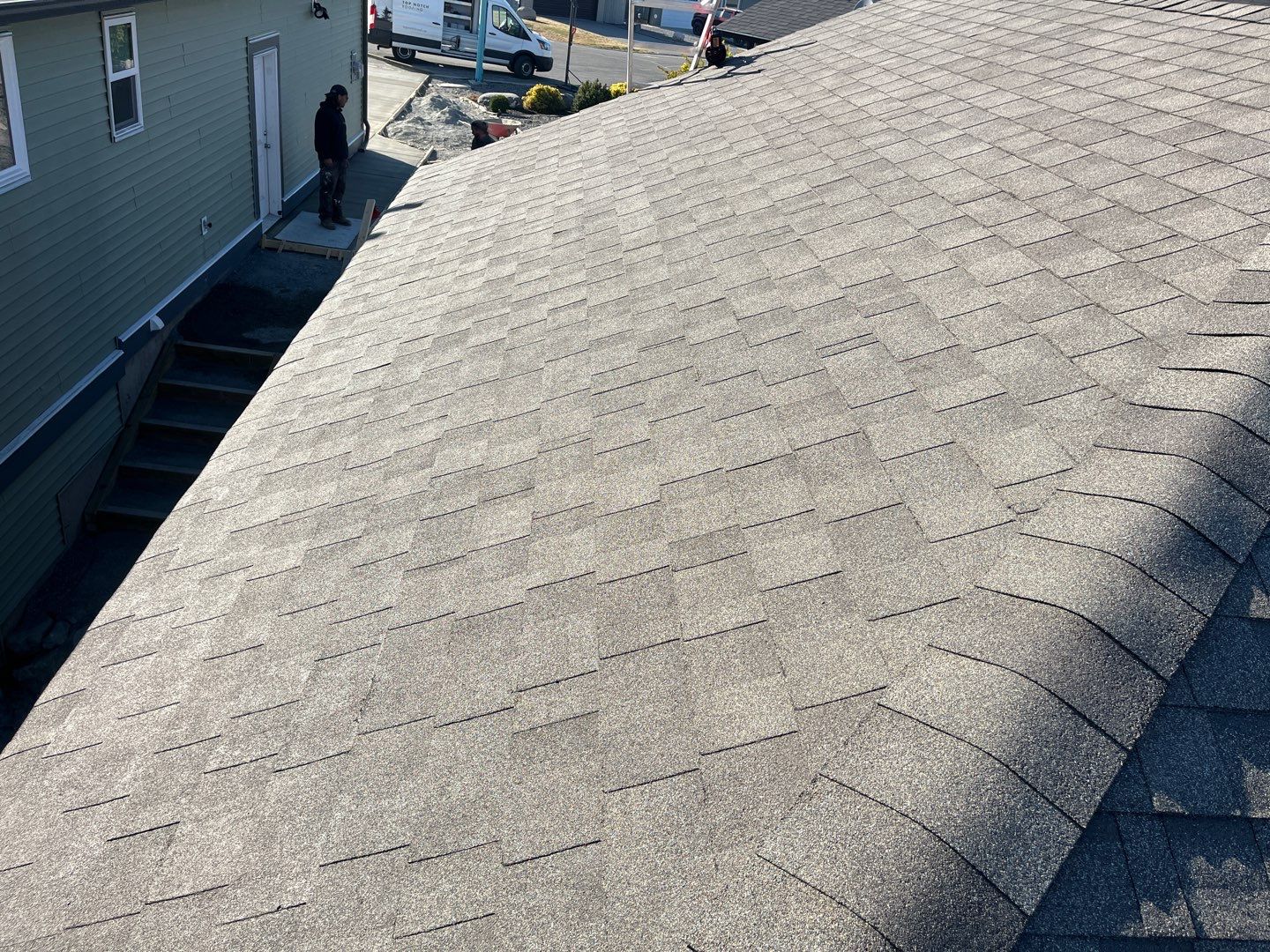 Residential Roofing Installation using IKO Weatherwood shingle by Top Notch Roofing Inc