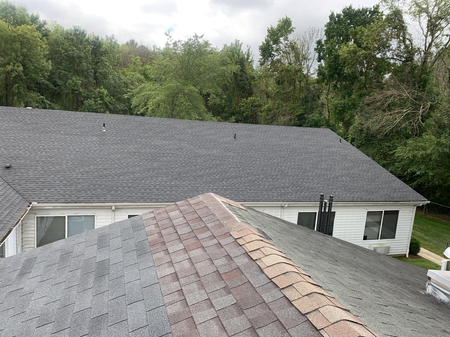 Re Roof  by American Roofing NC