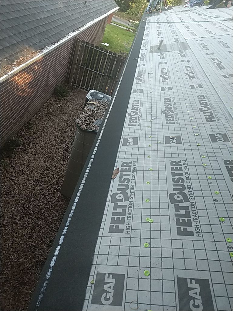 Residential Roofing Installation using Roof Replacement by American Roofing & Construction LLC
