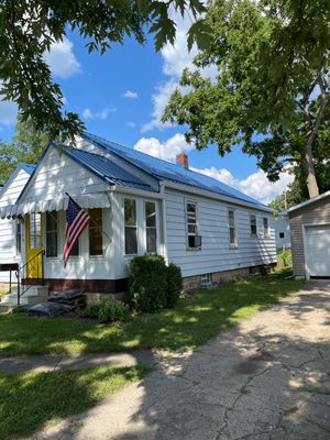 Bold Blue Exposed Fastener Metal Roof in Columbia City, Indiana