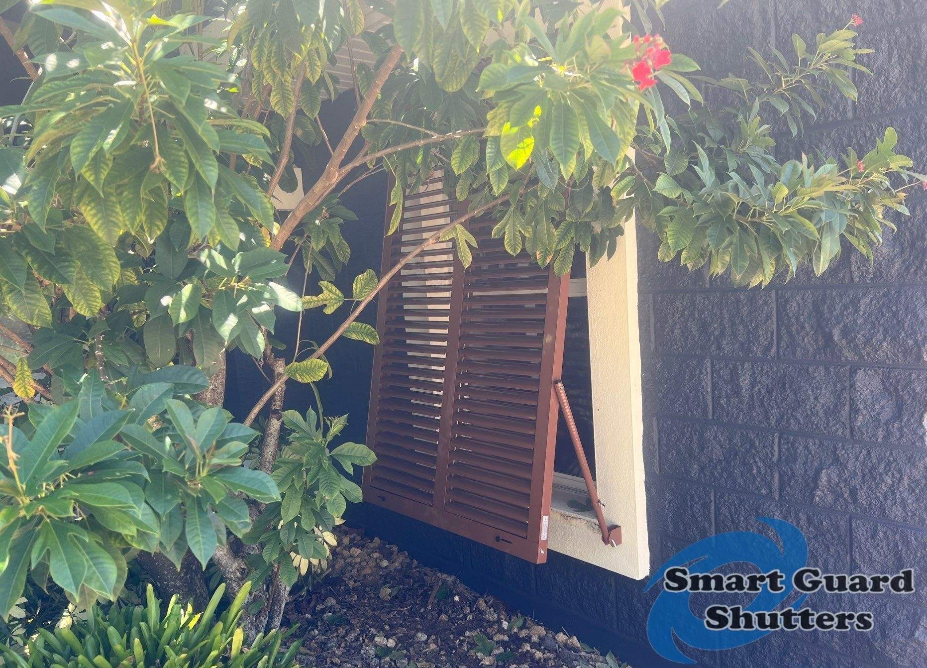 Impact Rated Bahama Shutters in Beige Brown by Smart Guard Shutters