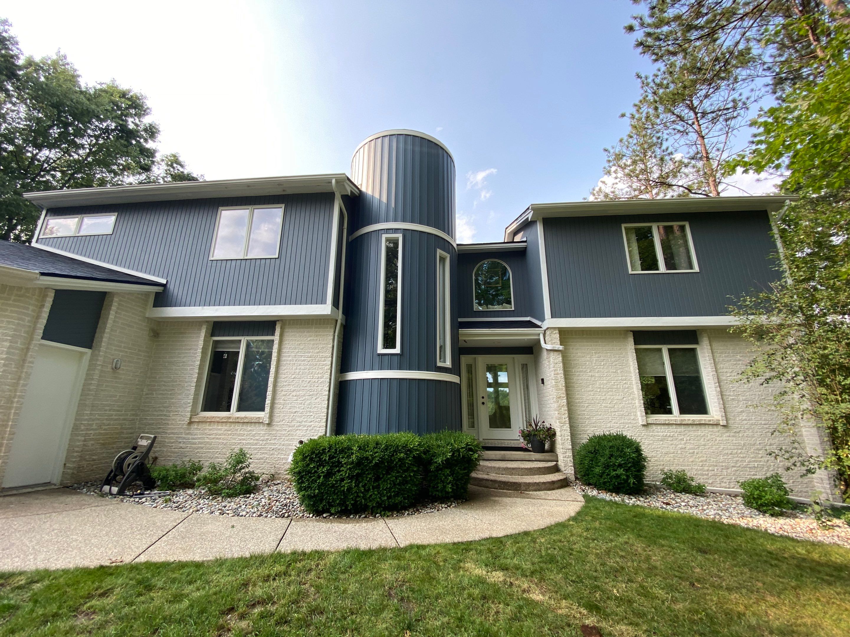 Siding Replacement using CertainTeed Board & Batten Pacific Blue by 180 Contractors