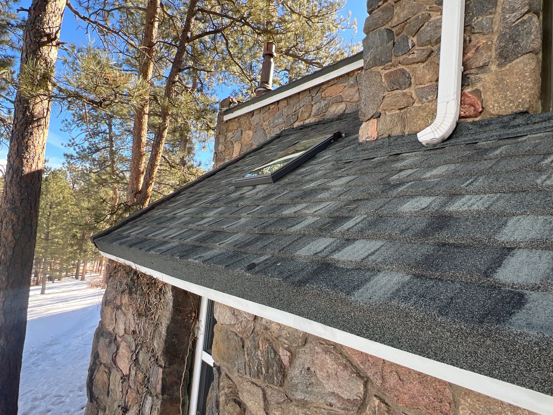 Residential Roofing Installation using Stone Coated Steel by Blue Peaks Roofing LLC 