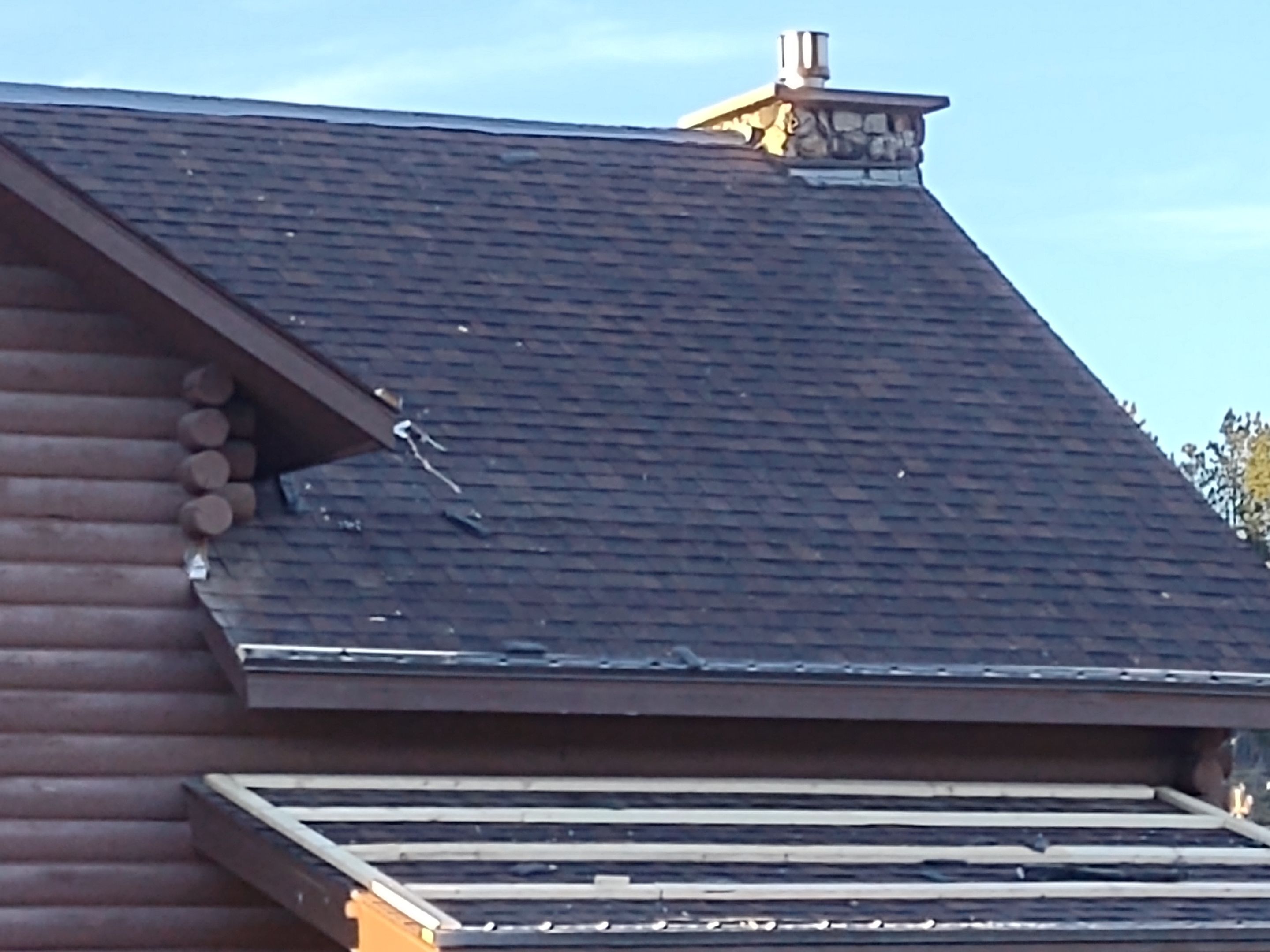 Hill Country Guest Ranch using Steel Roofing, Gutters, Log Cabin Staining by Lightning Exteriors