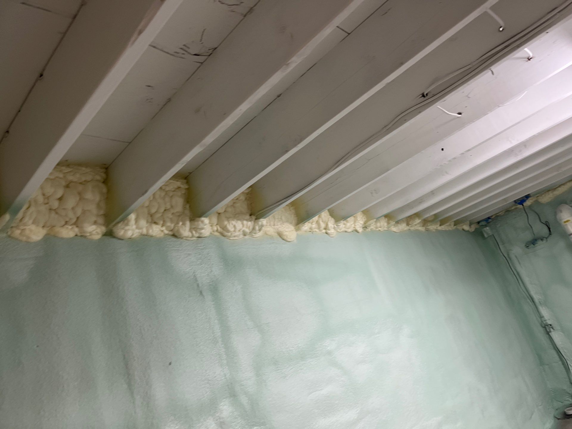 Basement Exterior Walls using Closed Cell Spray Foam by NYS Foam & Energy