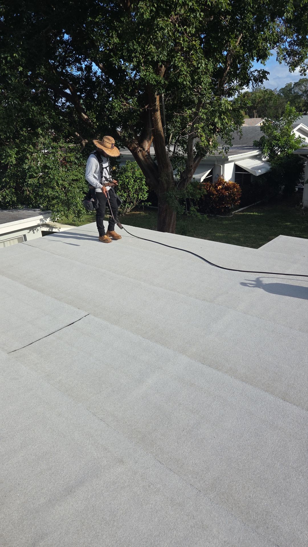 Silicone install-- Flat roof by Aastro Roofing