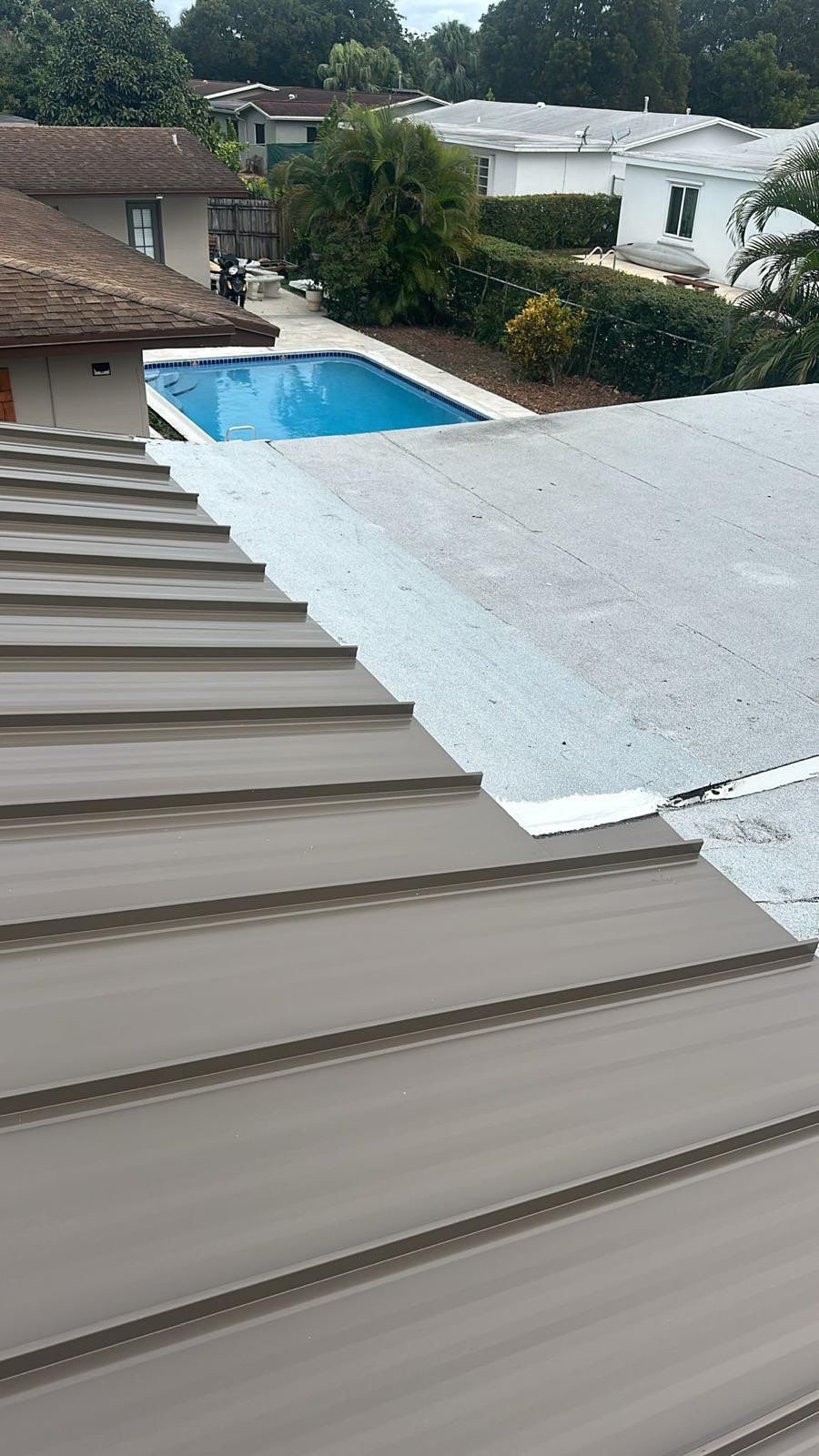 Residential Roofing Installation using Metal Roof  by City Roofing Inc