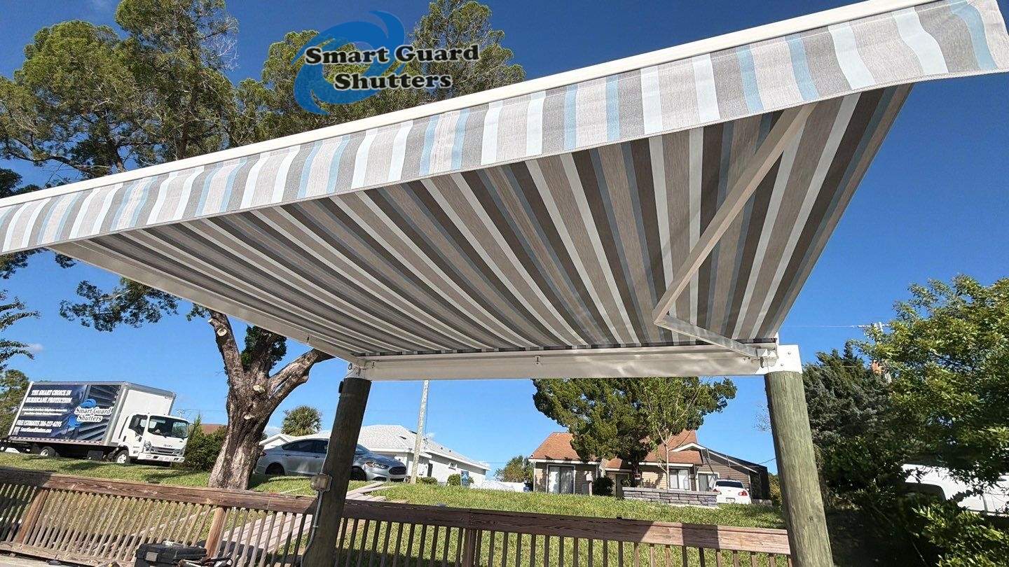 Retractable Awning in Sunbrella Marco Blue Grey by Smart Guard Shutters