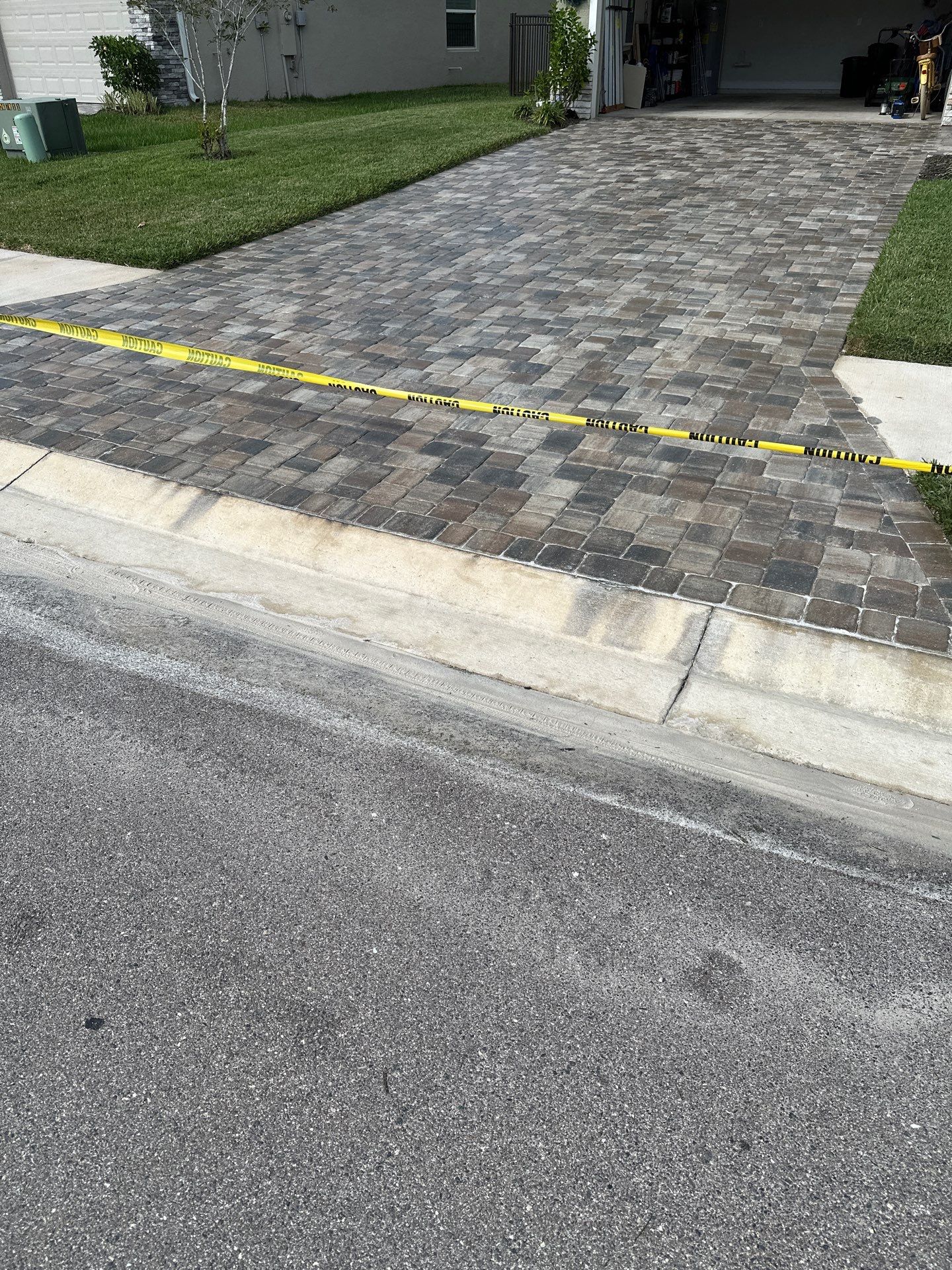 House Wash, Paver Driveway & Sidewalk Cleaning + Sanding & Sealing in Trevesta Community, Palmetto, FL by Sunshine AquaWash