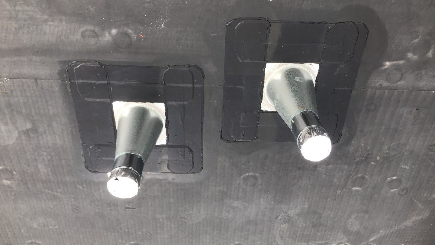 Commercial Roofing Installation using EPDM with white gutters by A Plus Exterior