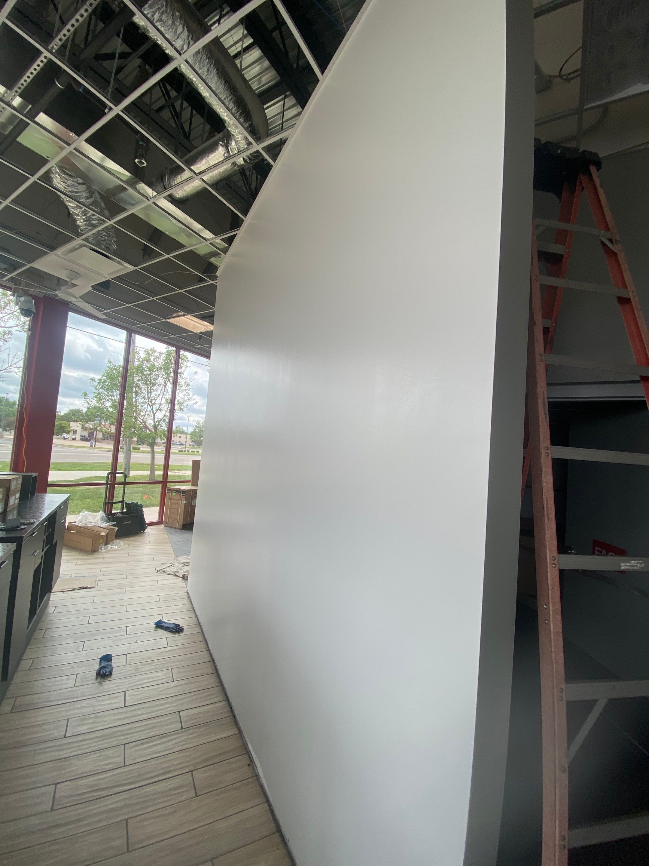 Commercial Interior Repaint for Remodel of Discount Tire in Wichita, KS by Midwest Paint LLC