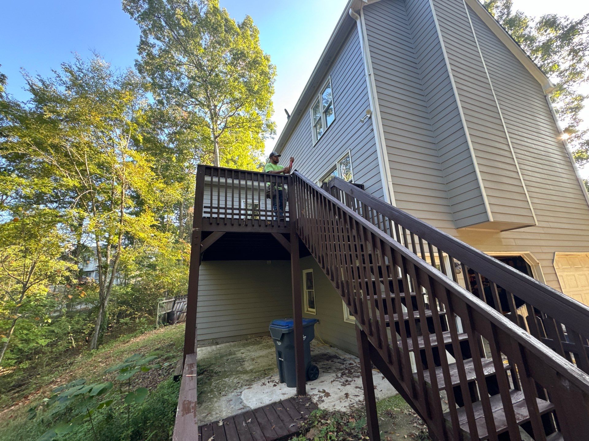 Elevated Deck Replacement with White Railings in Kennesaw by Swift Home Renovations 