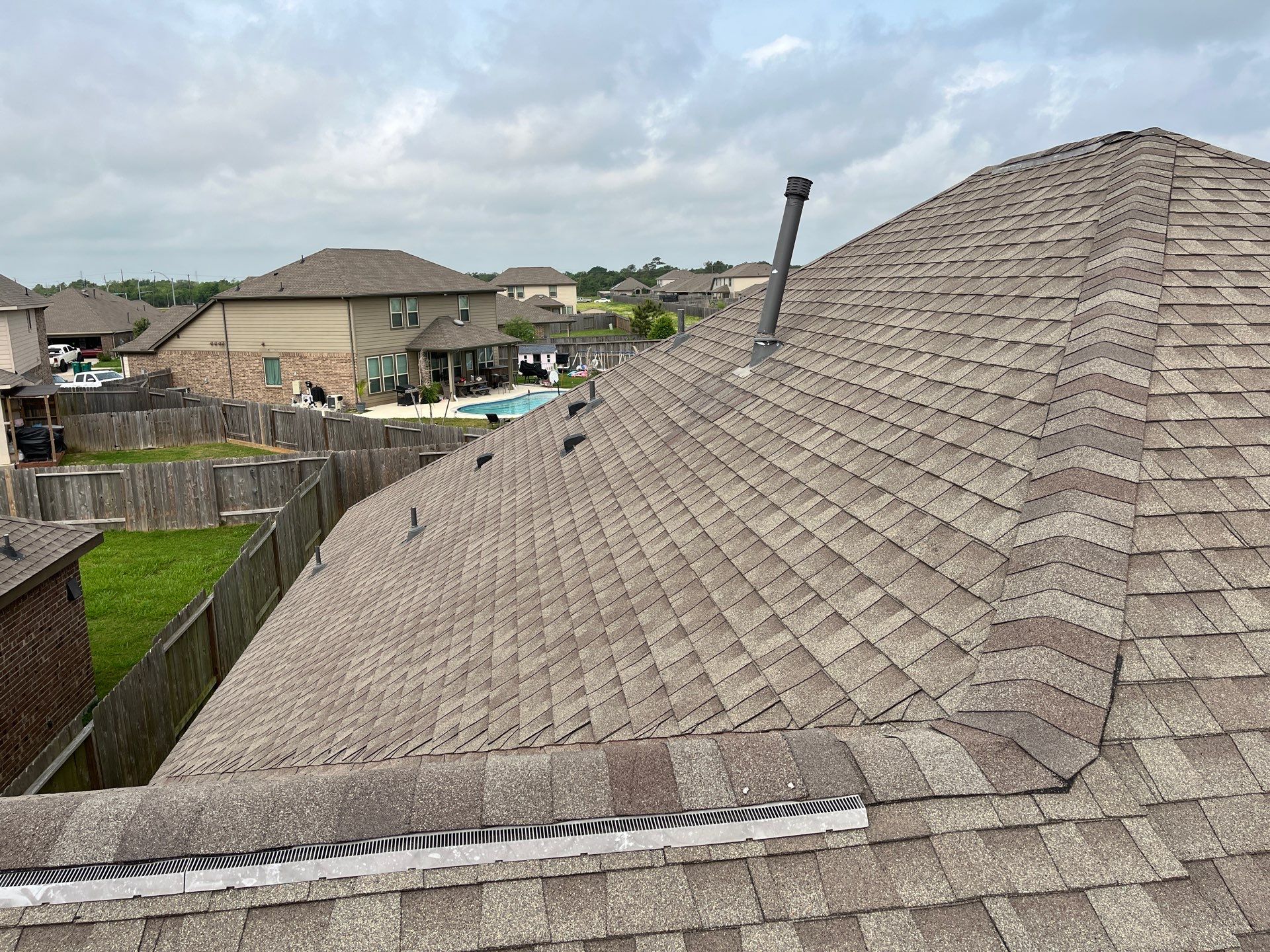 Hail Damage using Owen's Corning Duration (Lifetime) Shingles by Roof Repair Company