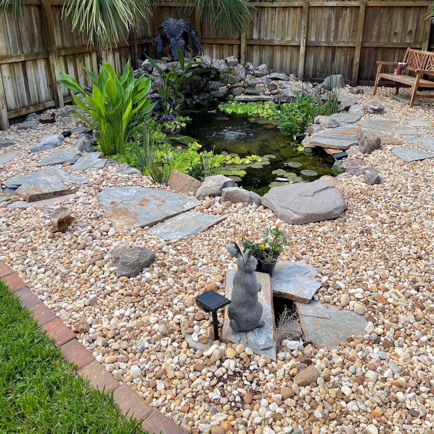 Small Koi Pond by Nature's Dream Landscape and Tree Service