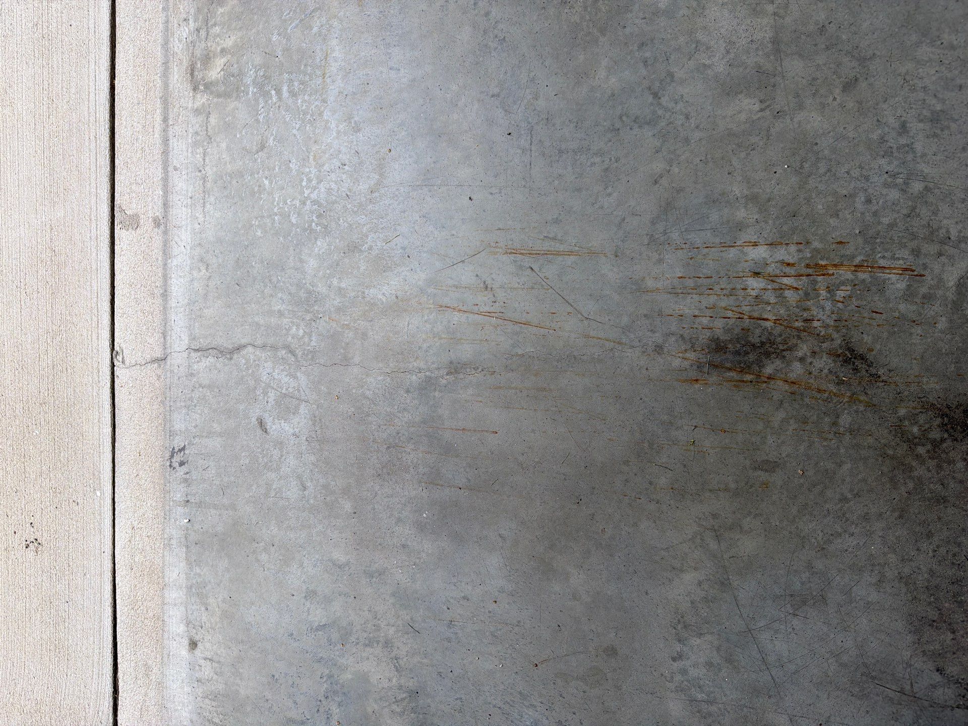 Coyote Garage Floor Coating in Sioux Falls by Select Painting, Coatings & Garage Cabinets