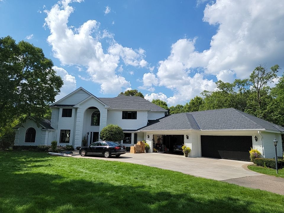 Residential Roofing Installation using Certainteed Landmark Moire Black by MODERN EXTERIOR SYSTEMS