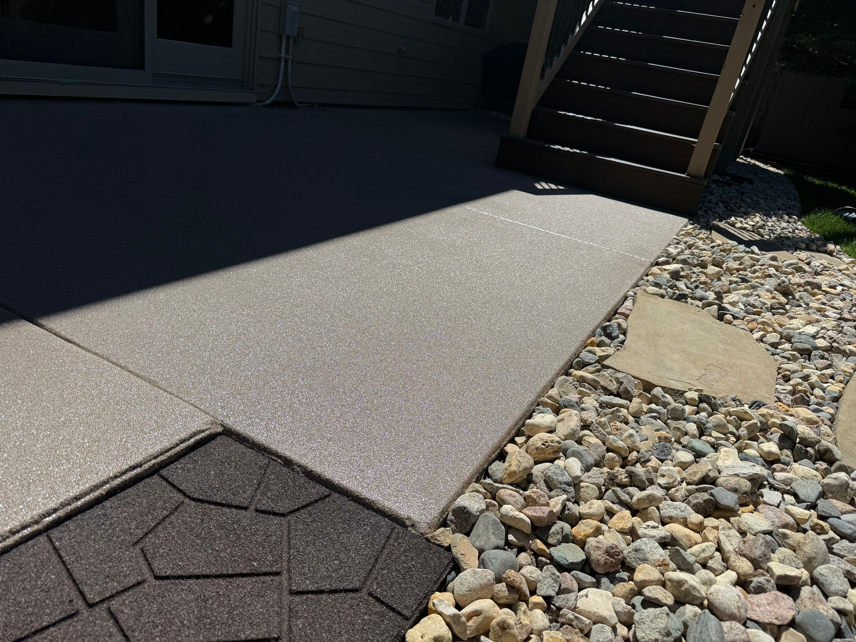 Textured Concrete Coating and Paver Patio Refresh in Sioux Falls by Select Painting, Coatings & Garage Cabinets