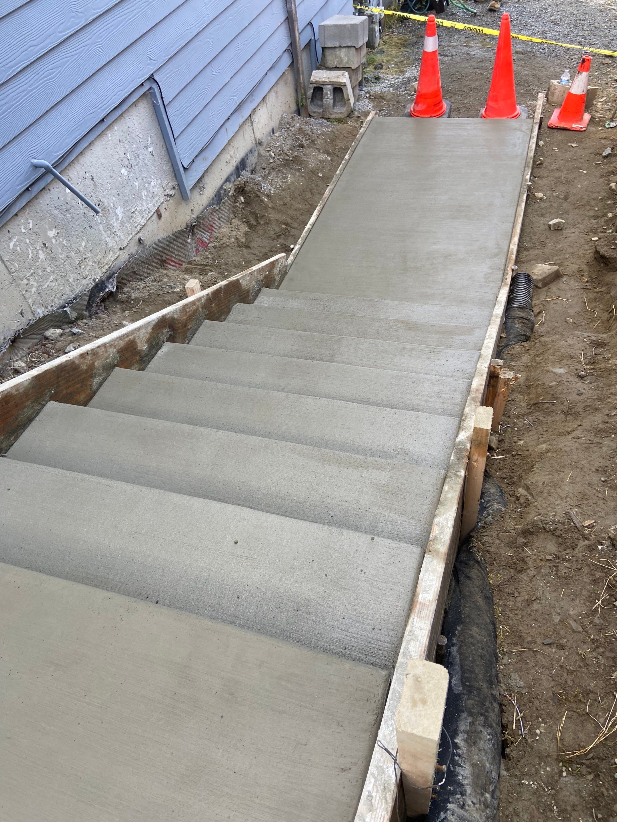 Jireh Outdoor Projects | Concrete Stair Repair and Retaining Wall by Jireh Asphalt & Concrete Inc 