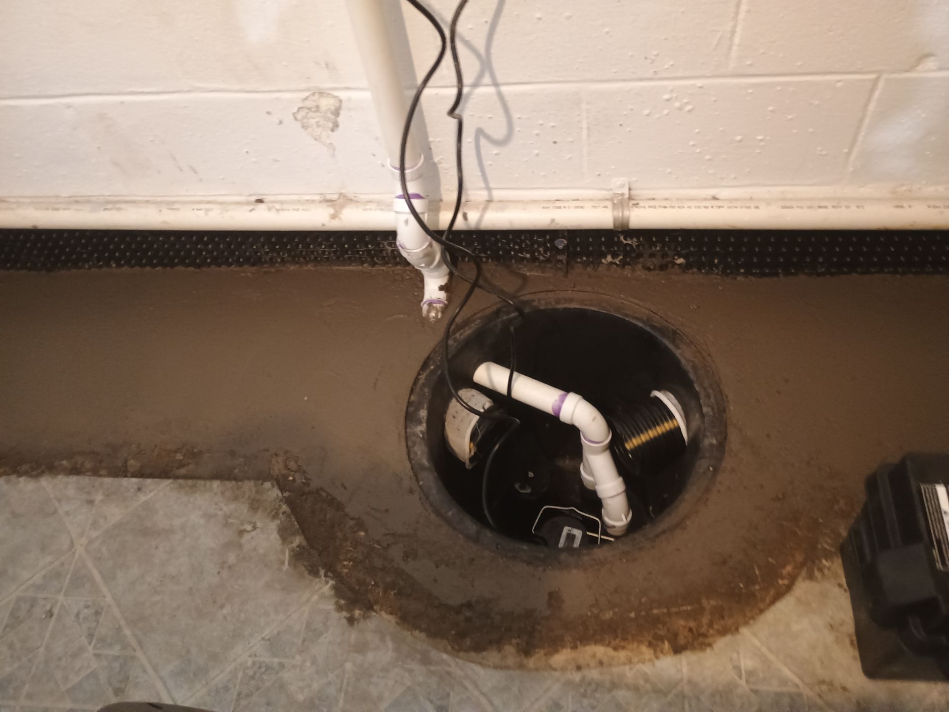 Drain Tile & a Sump Pump for our Property Management Partner by Waterproofing Northeast