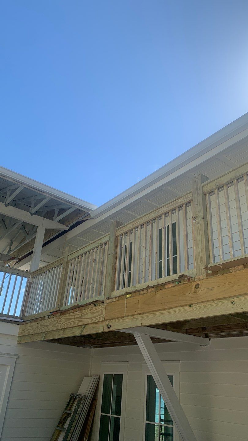 Seamless Gutter Installation Using White K-Style Aluminum Gutters by Gutter Professors