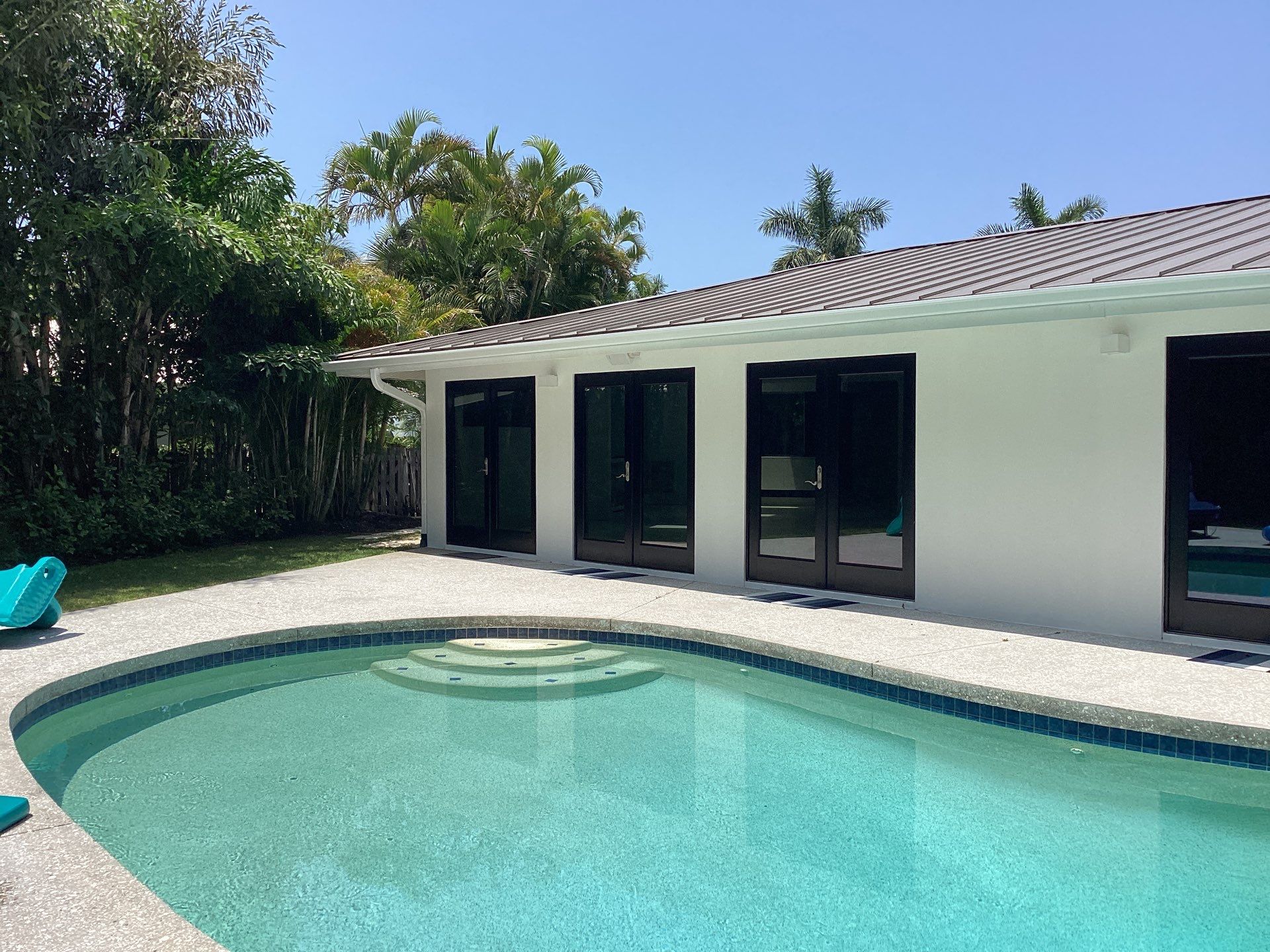 White Seamless Gutters and Downspouts in Sarasota FL by Gutter Professors