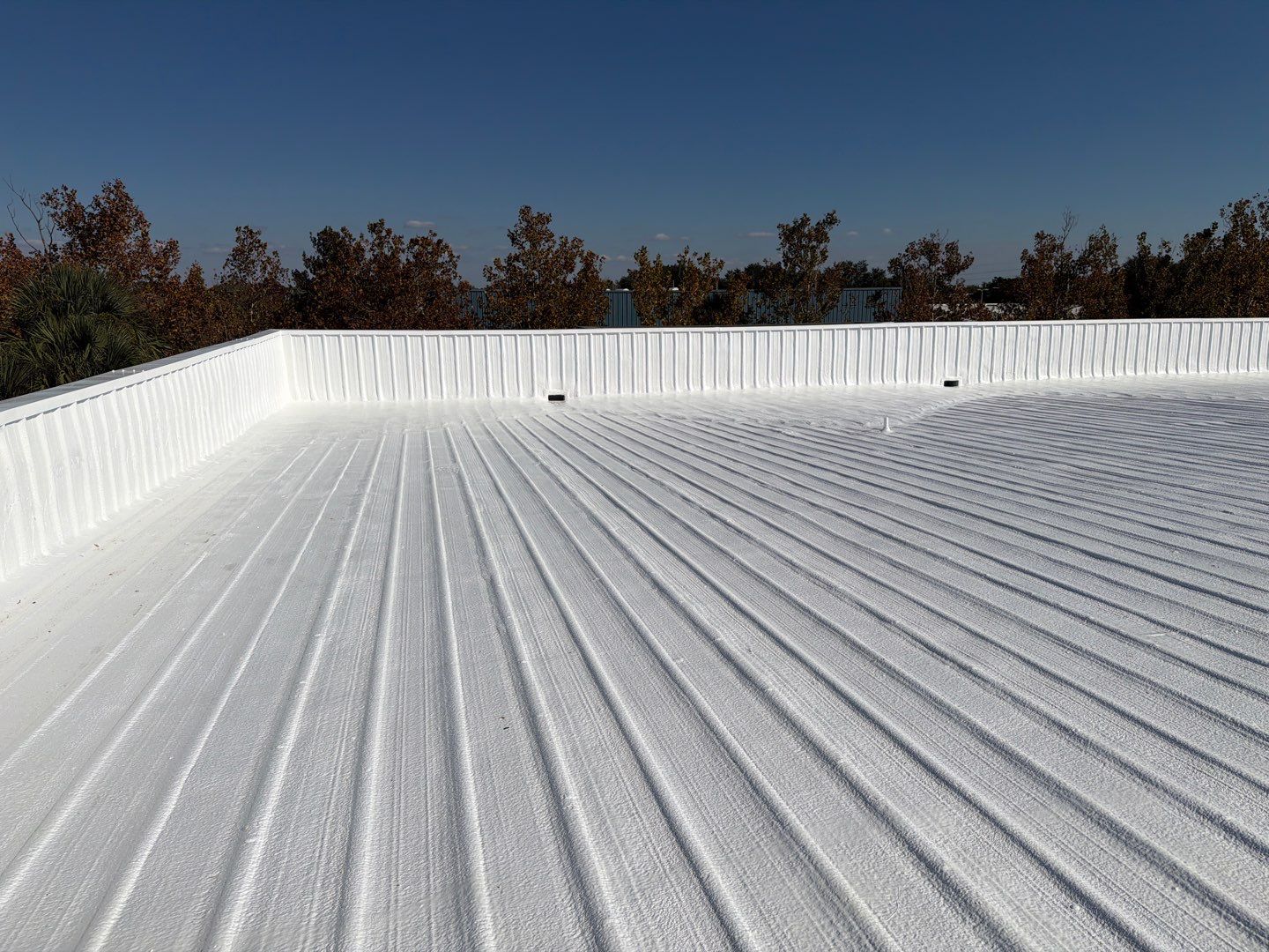 Orlando Commercial Metal Roof Restoration and Silicone Coating System by CES Roofing