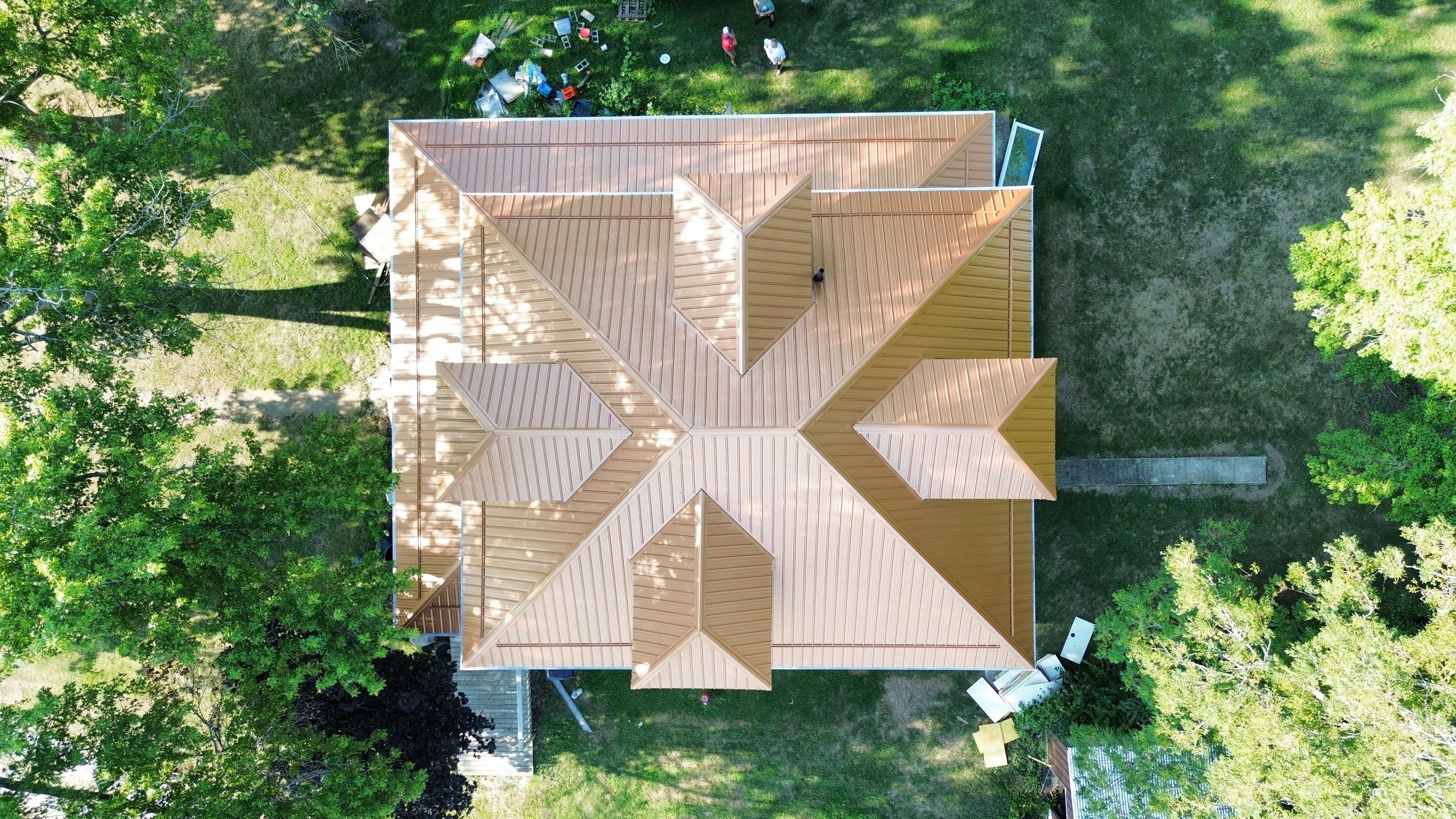 Residential Roofing Installation using Performance Panel Metal - Copper Metallic by RoofX 