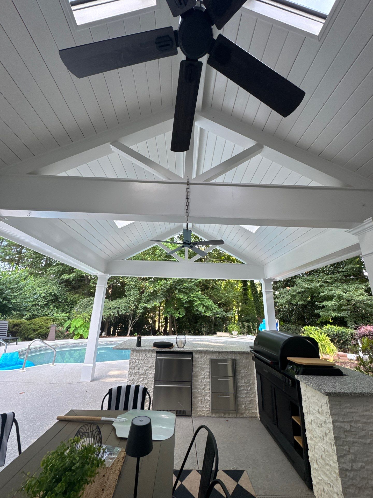 Marietta Poolside Pavilion with Custom Outdoor Kitchen and Pergola by Swift Home Renovations
