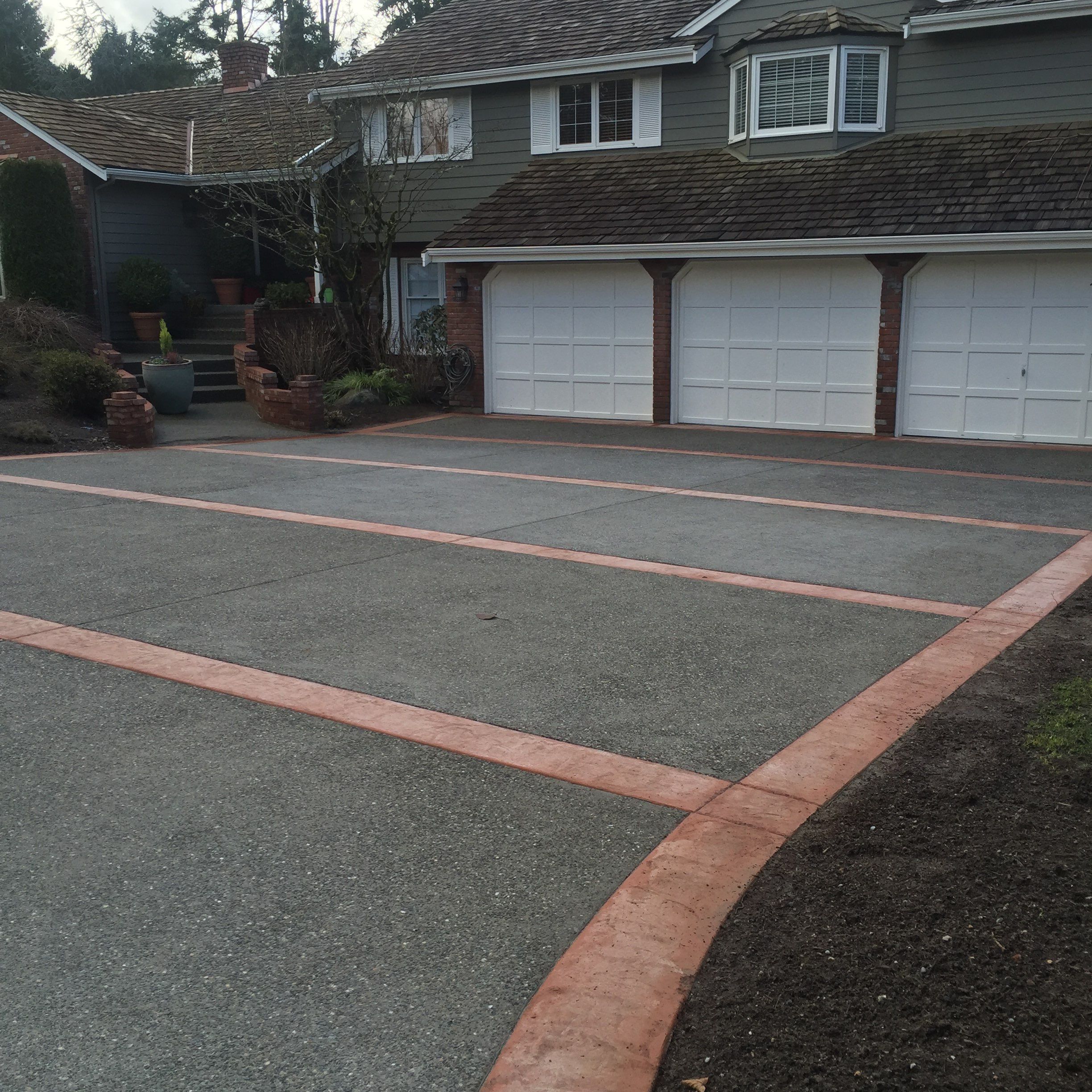 Custom Aggregate Driveway and Stamped Finish  by Jireh Asphalt & Concrete Inc 