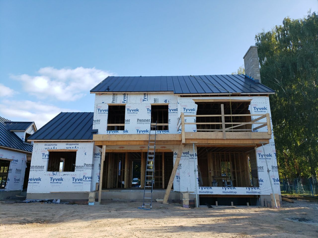New Home Construction using 16" Standing Seam Panels by Jay Carter Roofing & Sheet Metal