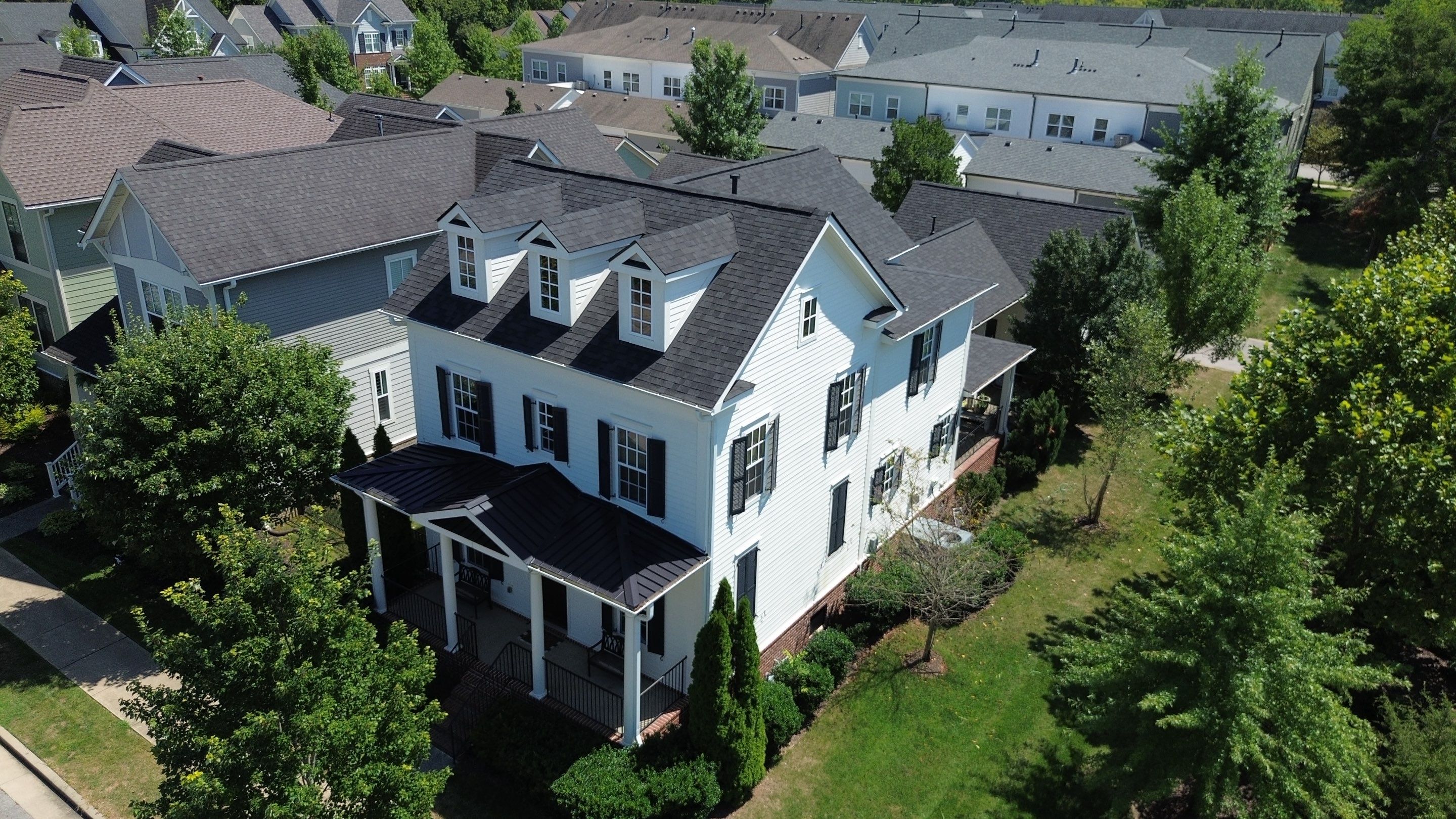 Architectural Shingle and Standing Seam Metal Roof Replacement in Franklin by Shinglesmiths Roofing