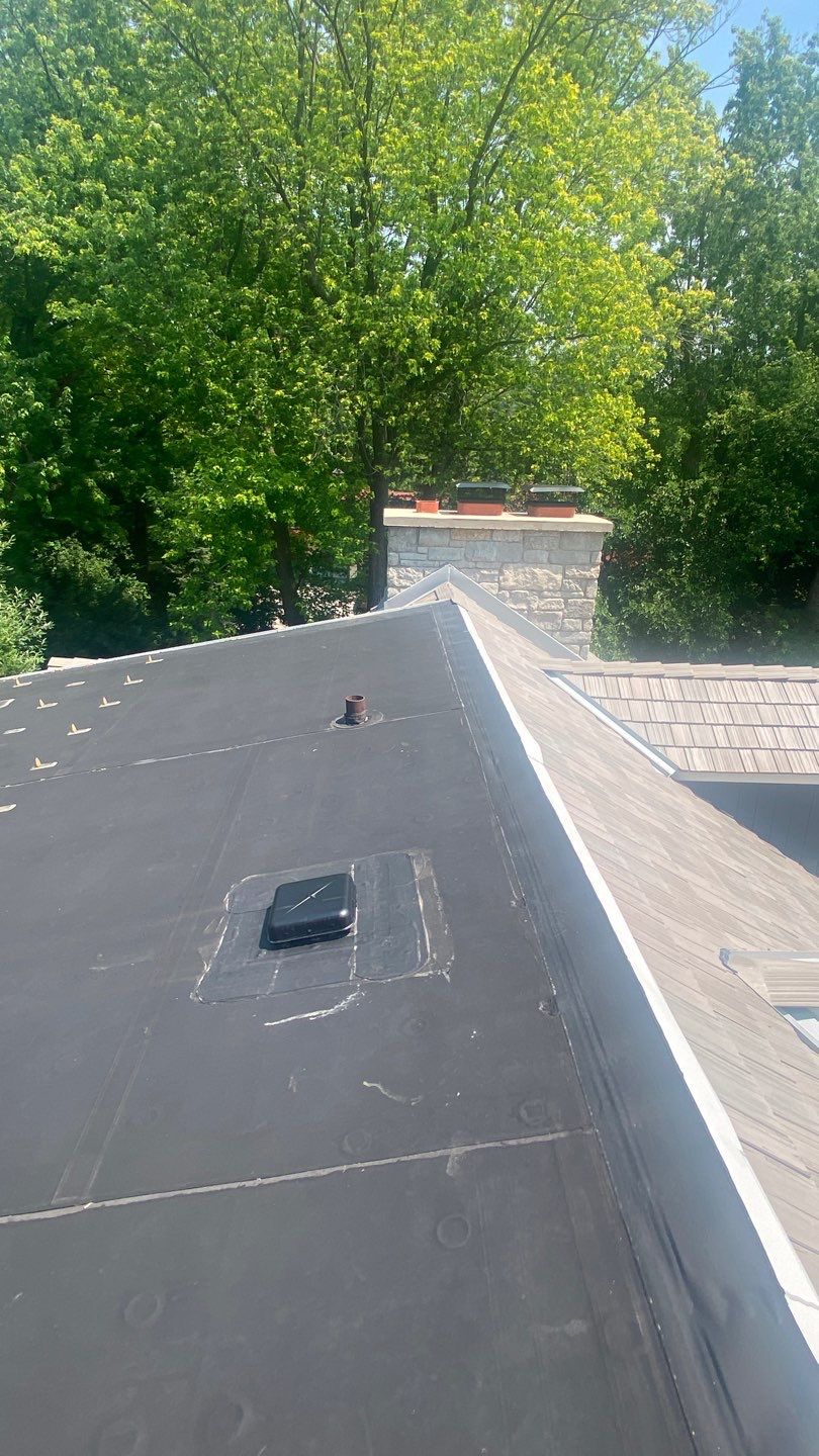 DaVinci Roof Installation with Snow Guards in Oconomowoc Lake by Custom Installations