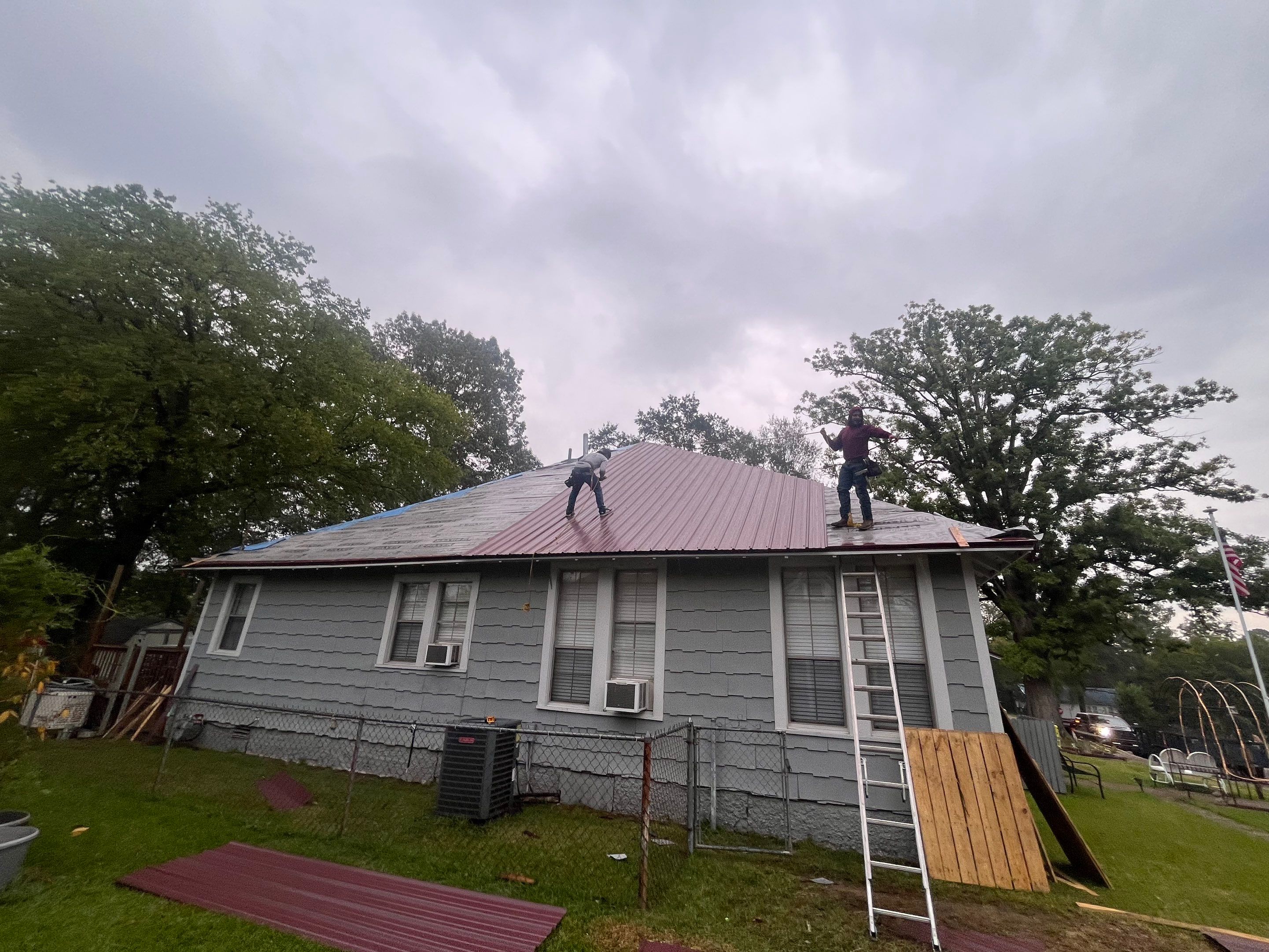 Residential Metal Roof Replacement using Reed's Metals: Colored Residental Panel (Burgundy) by Hostetler Roofing