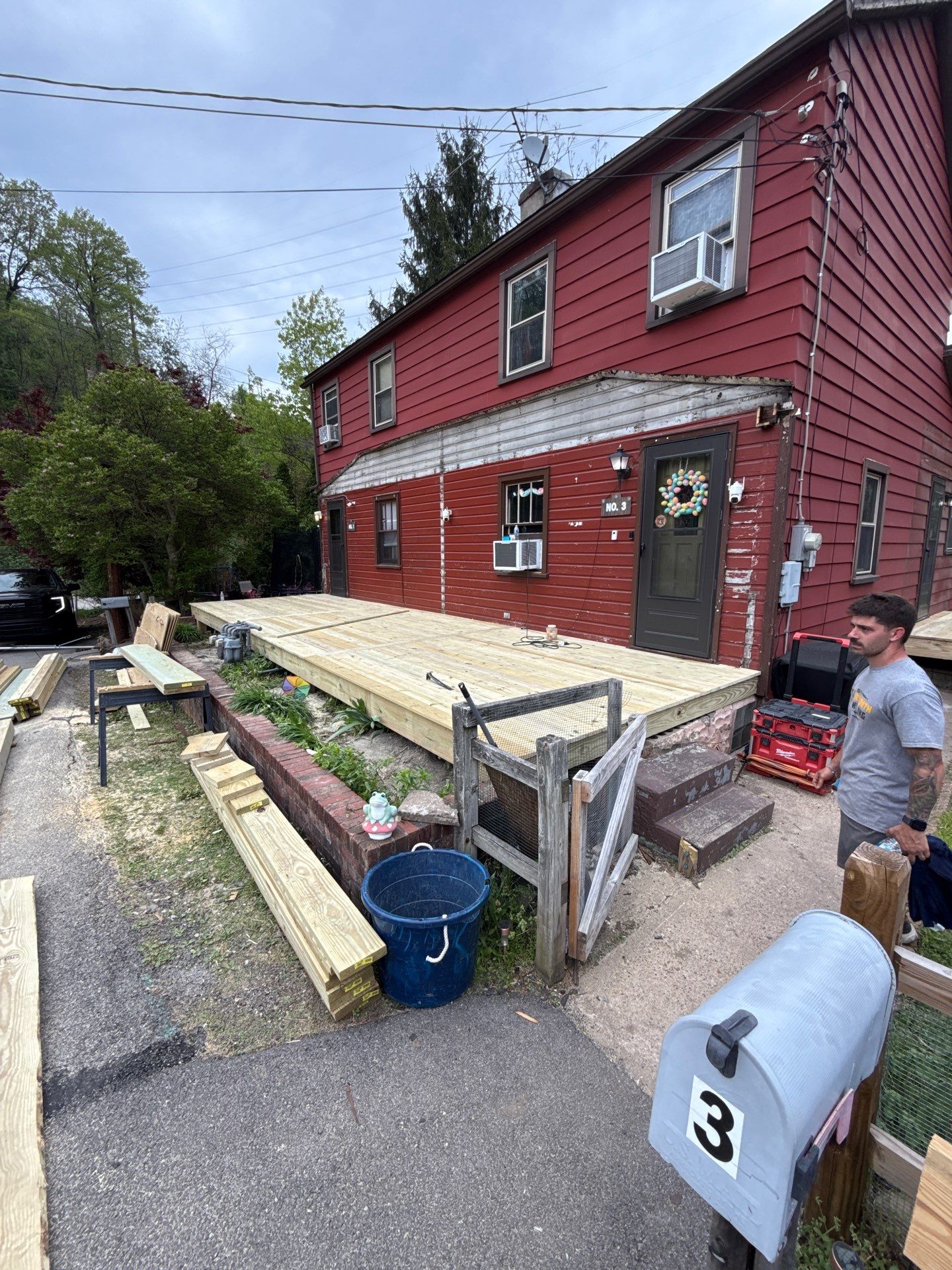 Roof sunspace deck  by Cousins Roofing Siding & Decks