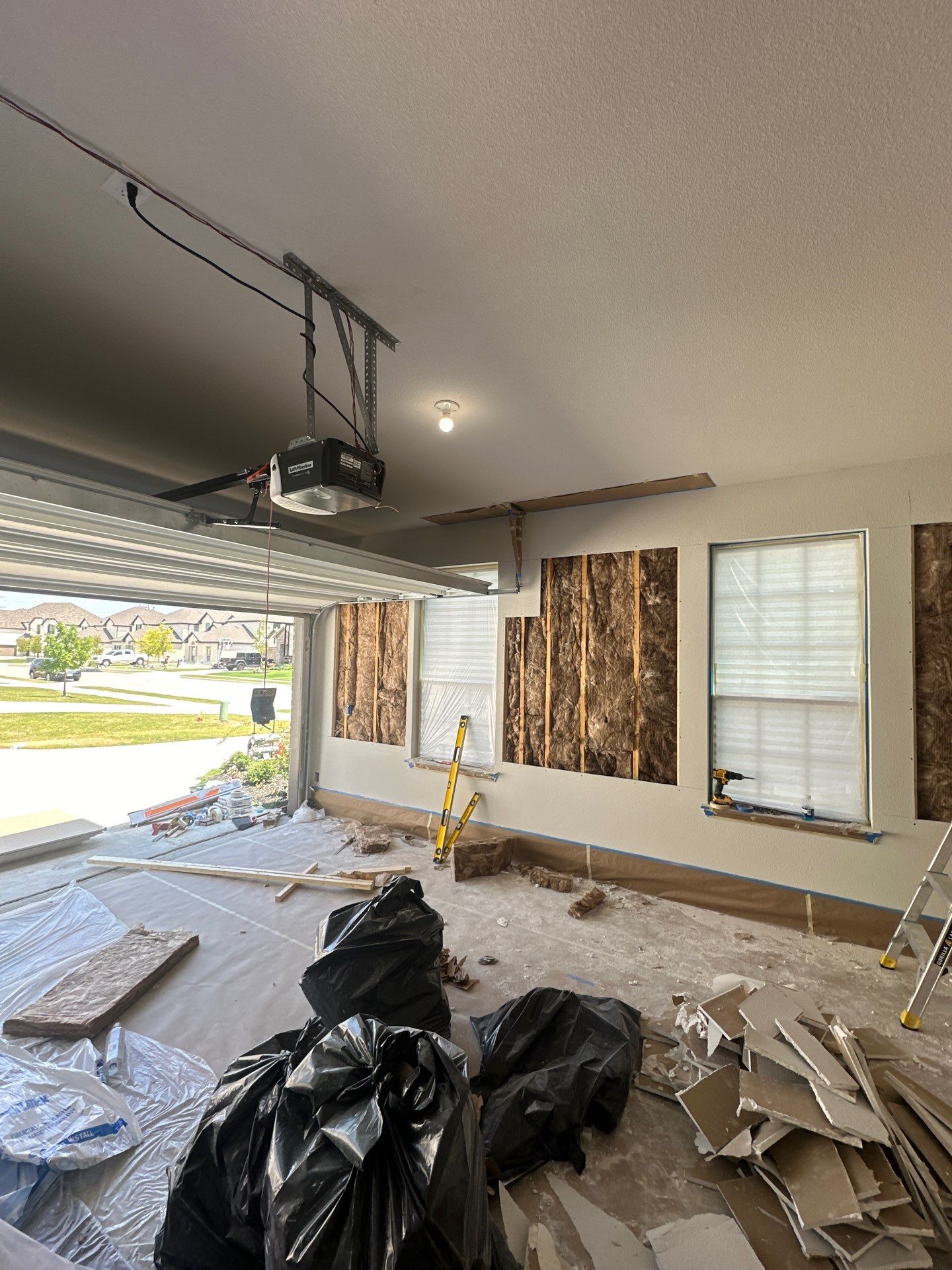 Kitchen Remodel/ Garage Gym Conversion by Apex Insulation Solutions