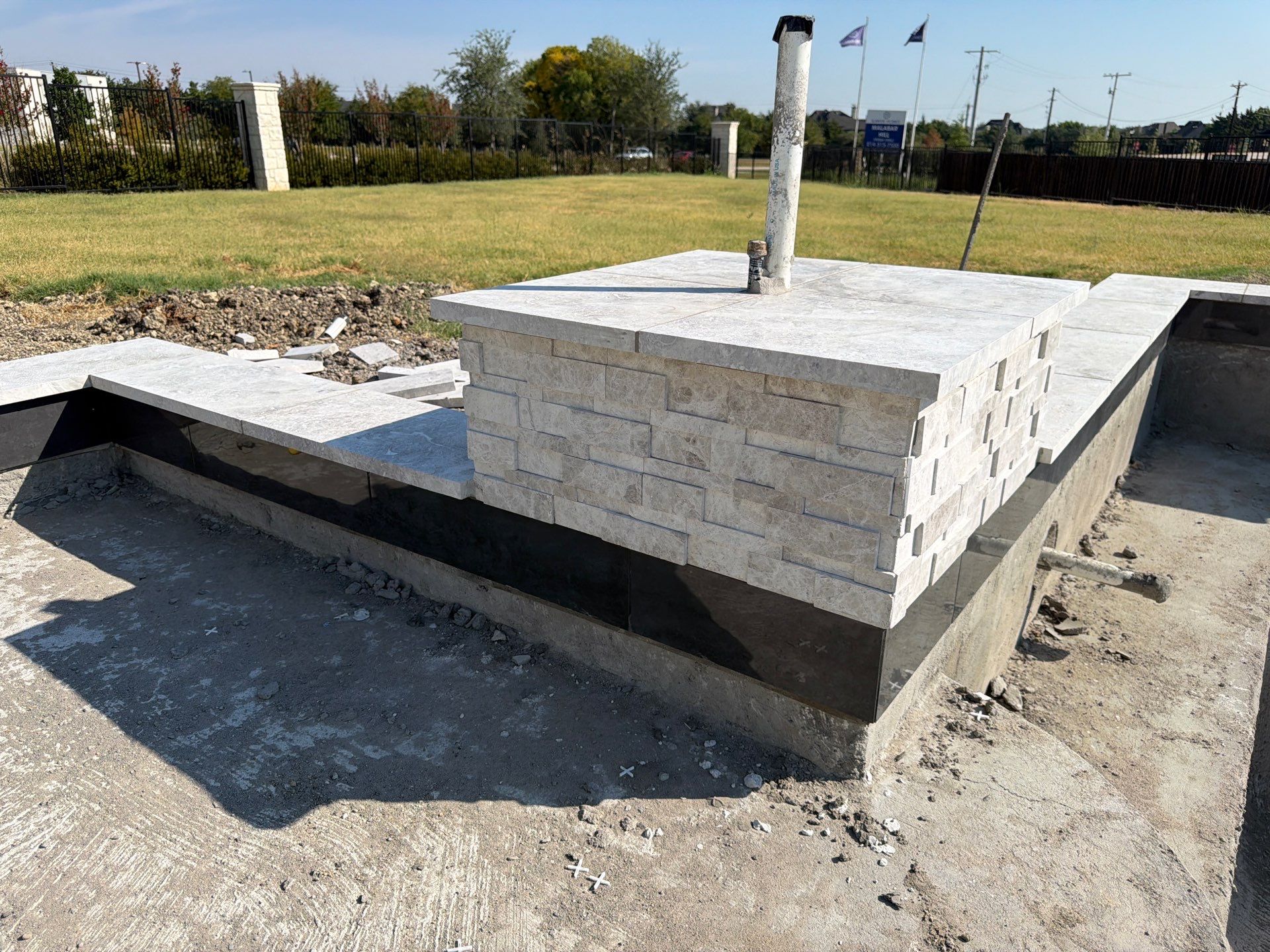 Modern Geometric Pool with Raised Spa, Tanning Ledge and Fire Bowls by Pinnacle Pools and Spas - DFW
