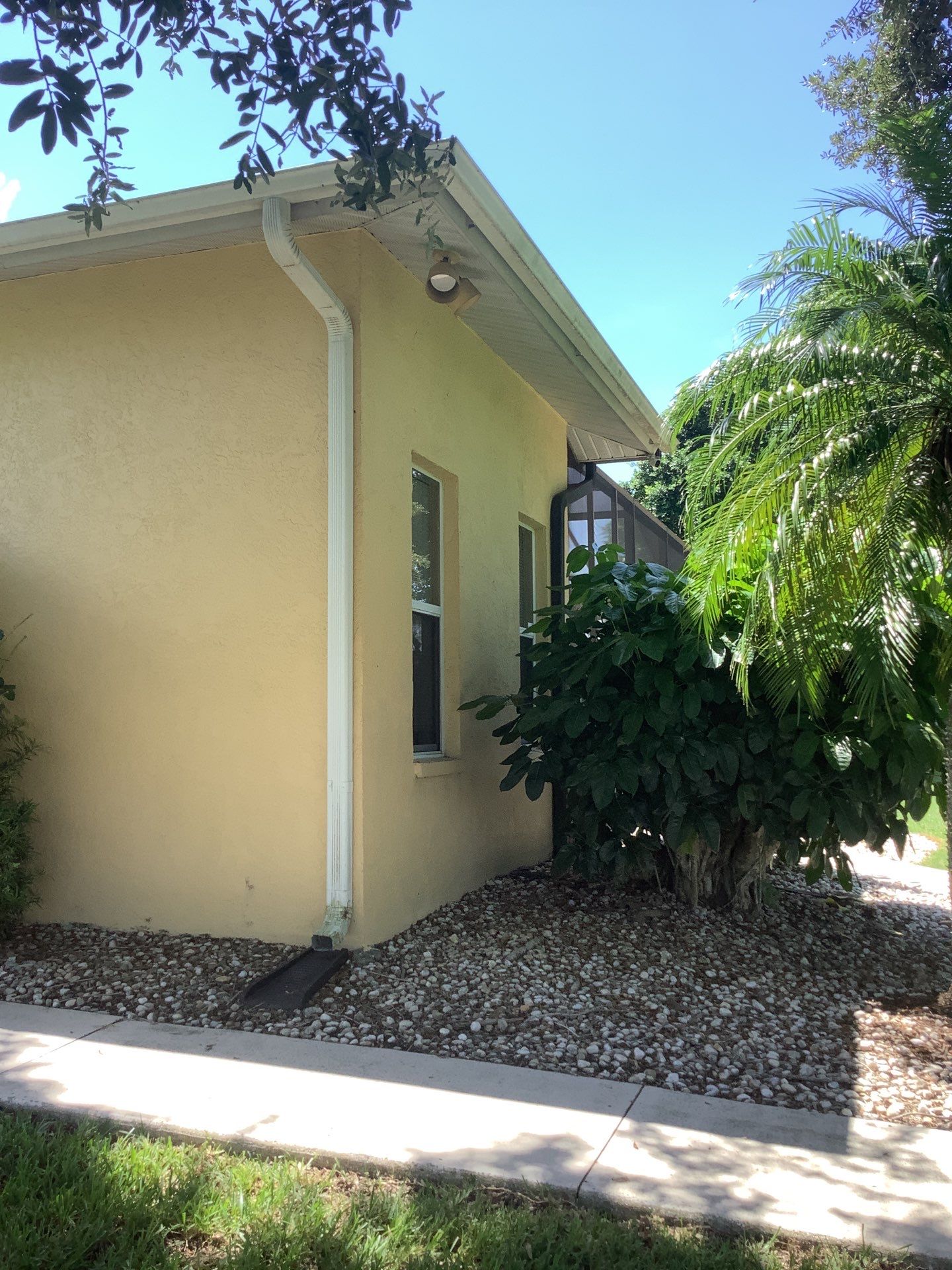 White Seamless Gutters Installation in North Fort Myers FL by Gutter Professors