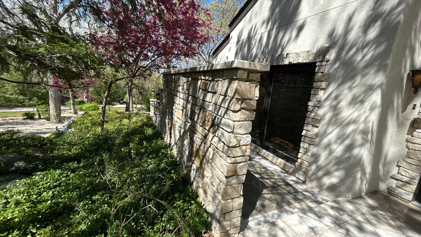 natural stone using Algaecide, soft wash soap by Northern Power Washing LLC.