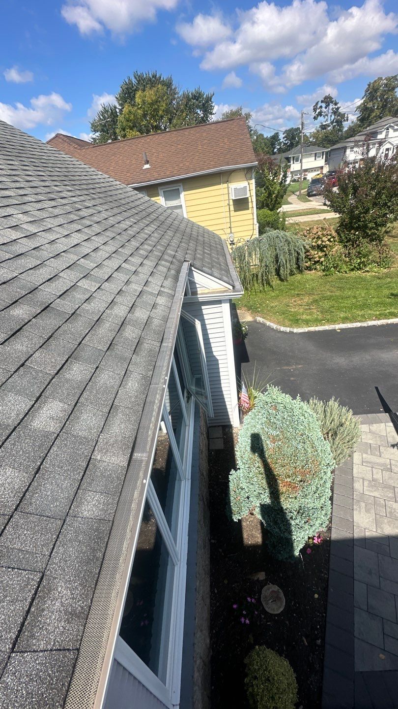 Cleaning and Microguard Installation. by Above All Gutters 