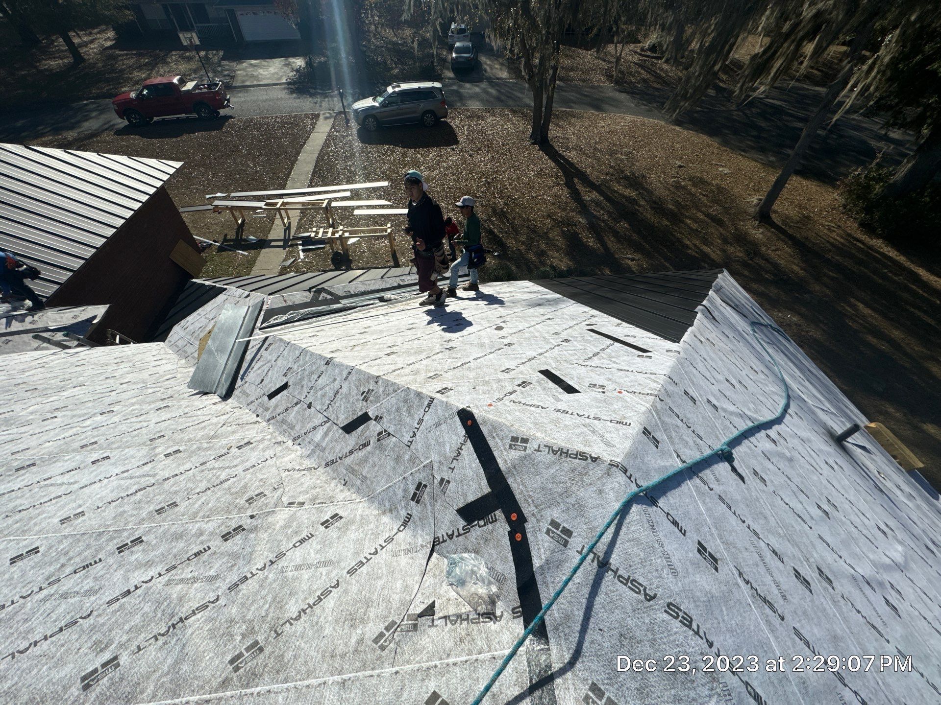 Residential Roofing Installation using Benton 26Ga 1inc Snapcock Metal Roof KYNAR Matte Black by Talya Roofing