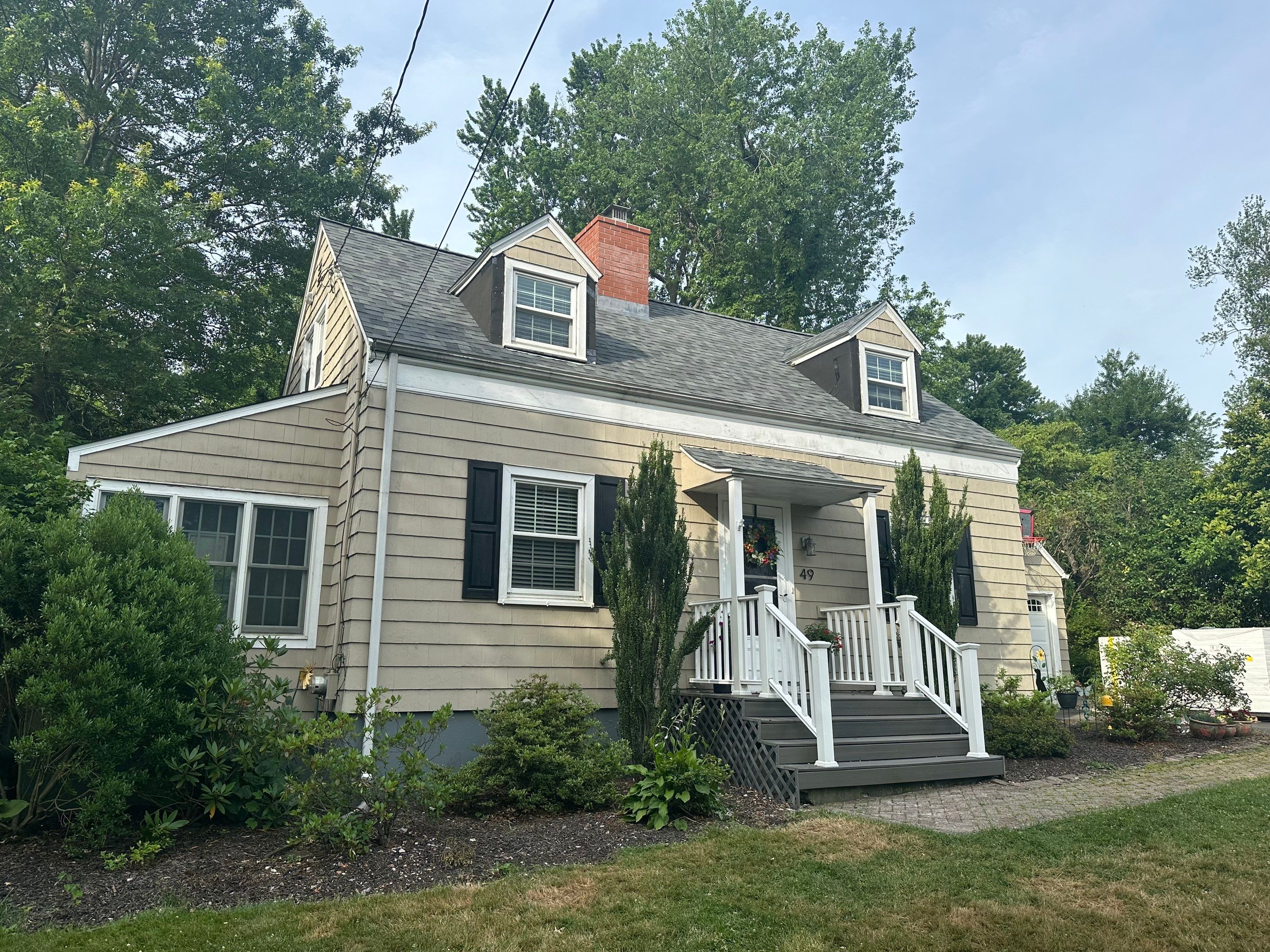 Complete Exterior Estate gray with Pacific Blue Siding by A Plus Exterior