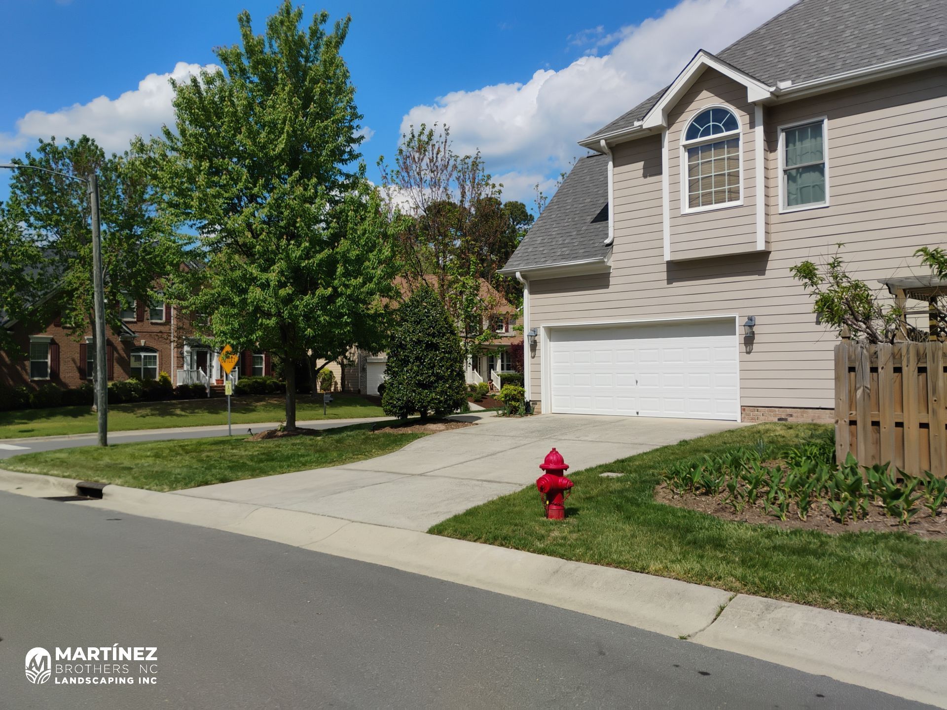 Fixing brown spots in grass in Durham by Martinez Brother’s Nc Landscaping Inc