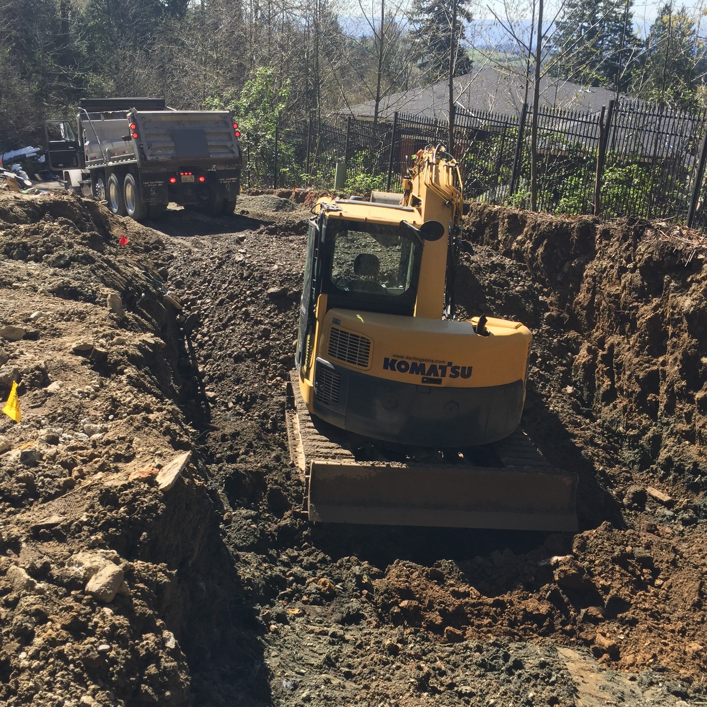 Asphalt Driveway and Stamped Concrete Patio Finish  by Jireh Asphalt & Concrete Inc 