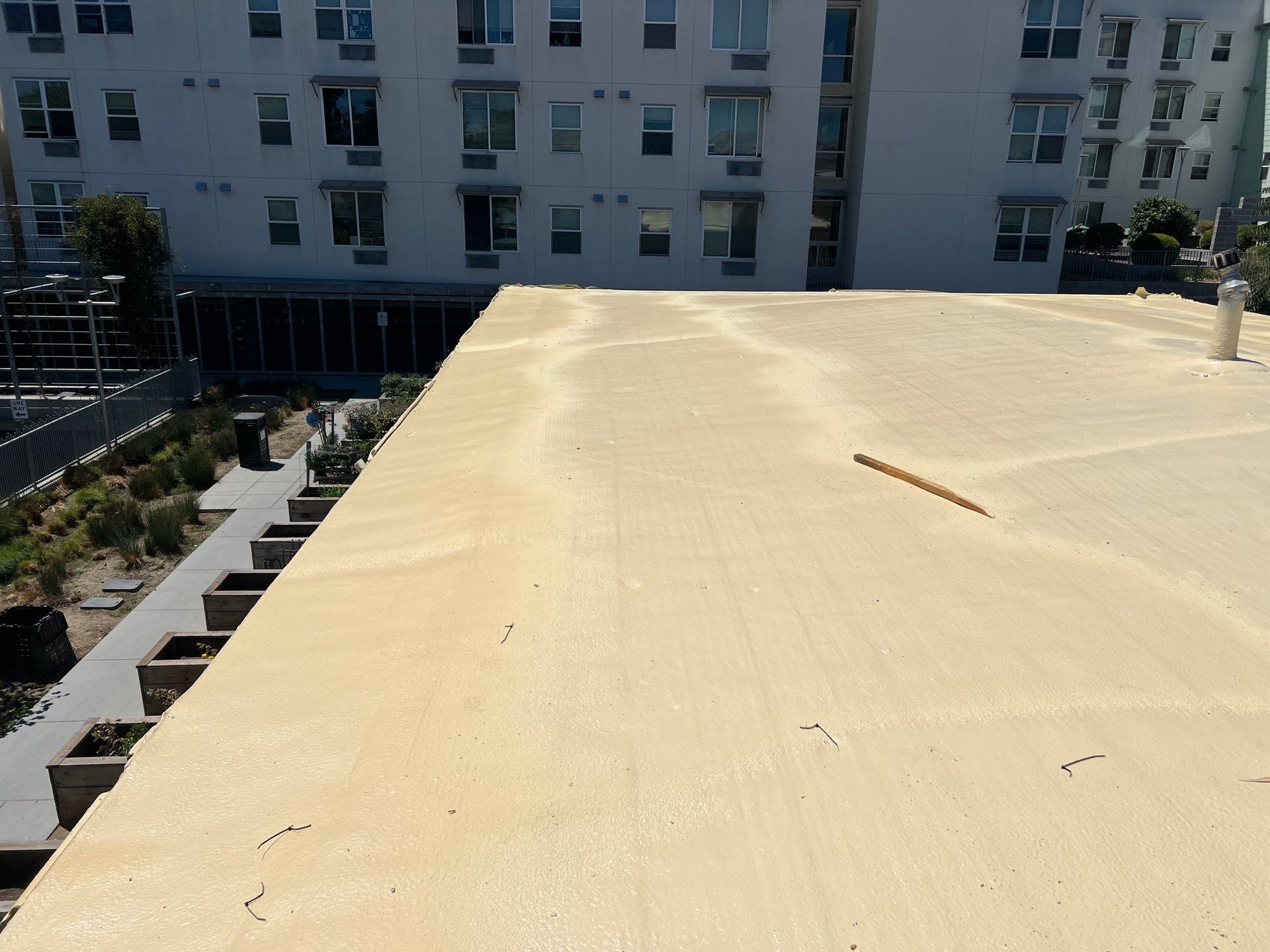 Foam Refurbish using Conklin Benchmark/PUMA XL coatings and spray foam by Straight Edge Roofing Inc