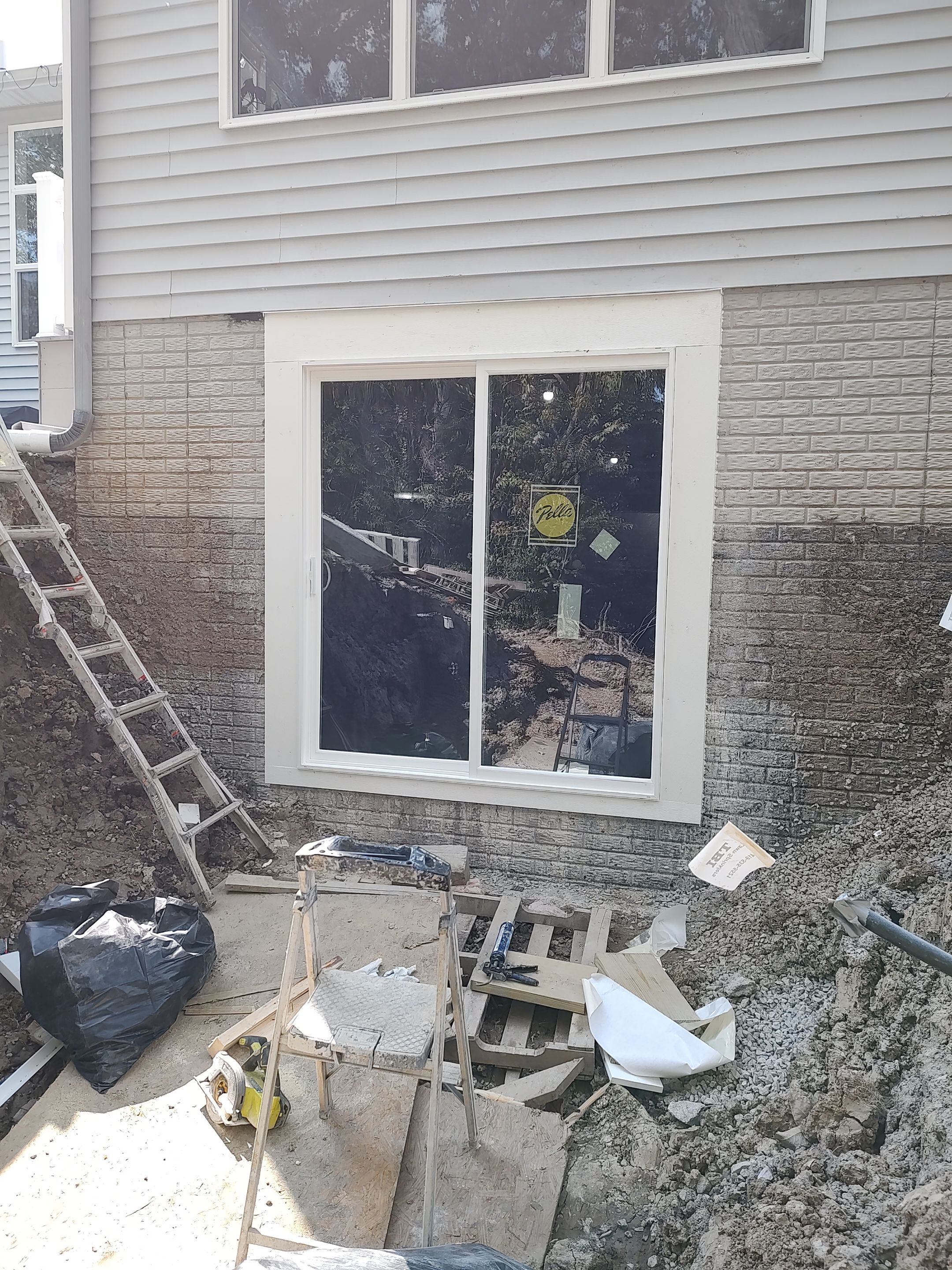 Egress Door Install using Egress Sliding Walk-Out Basement Door by Toledo Basement Repair