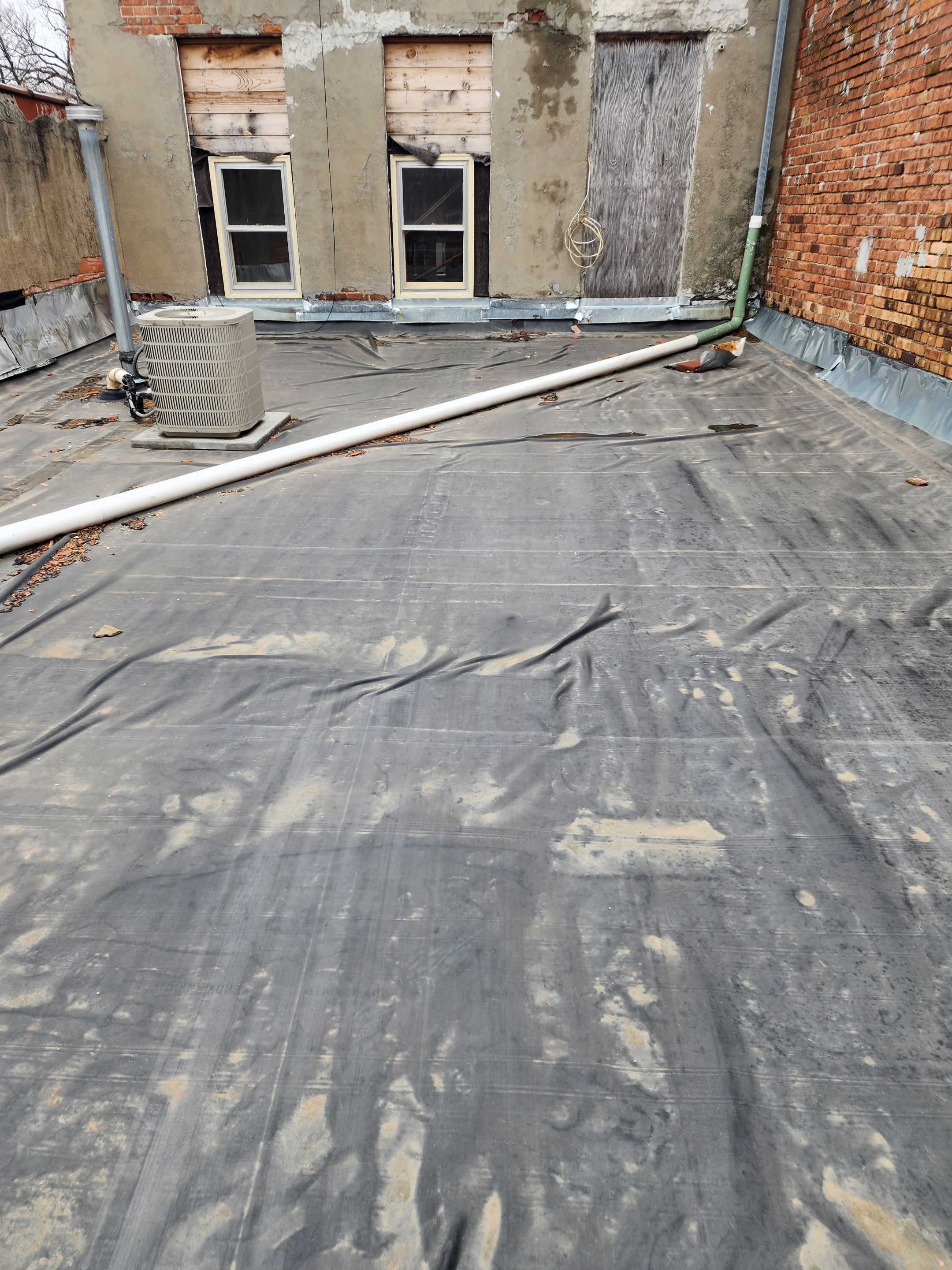 Roof Recover on a downtown building in Lake City  by Grell Roofing, LLC
