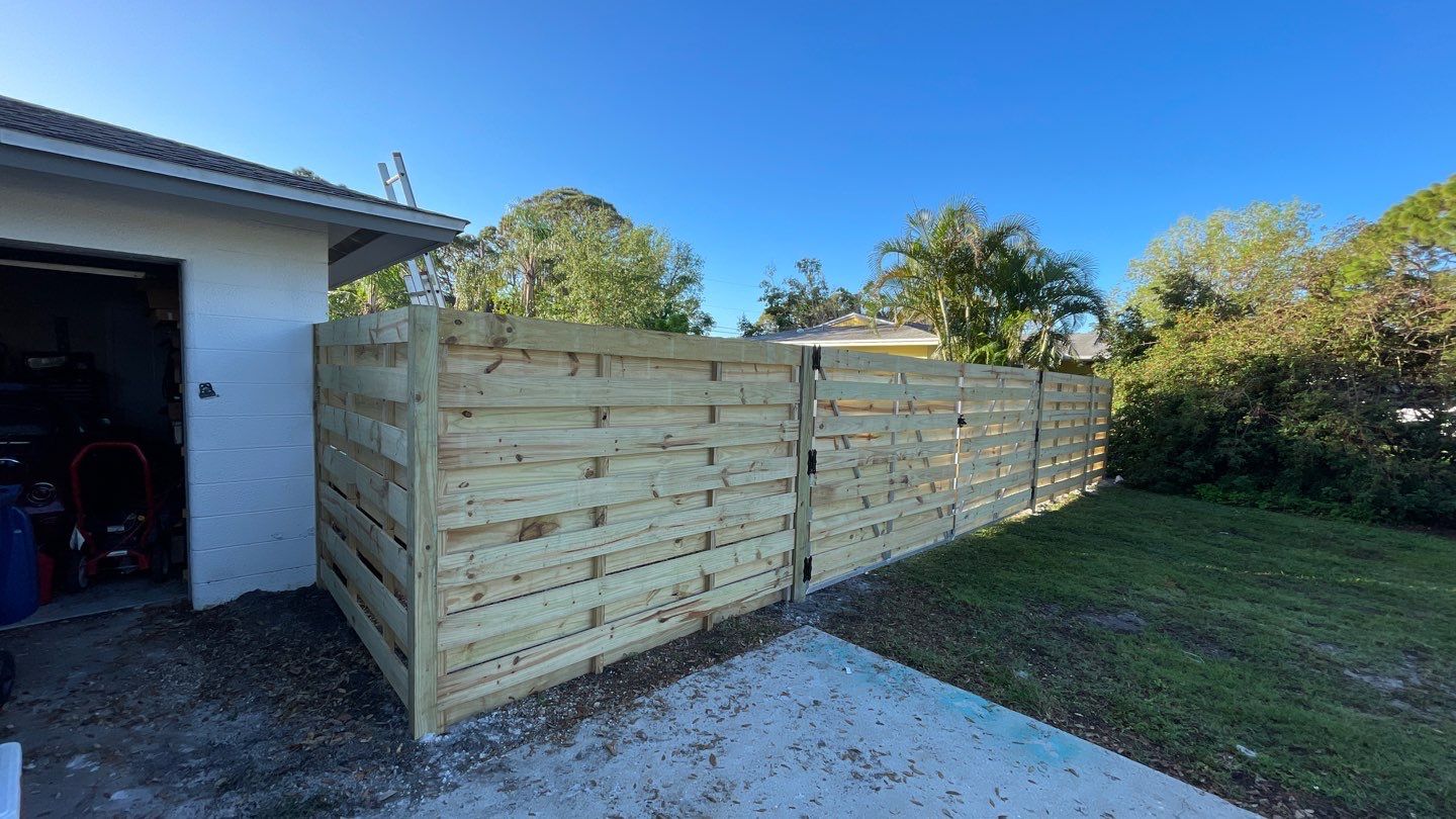 Wood Fence Installation using Horizontal Shadowbox Wood Privacy Fence by Asap fence and gates, LLC