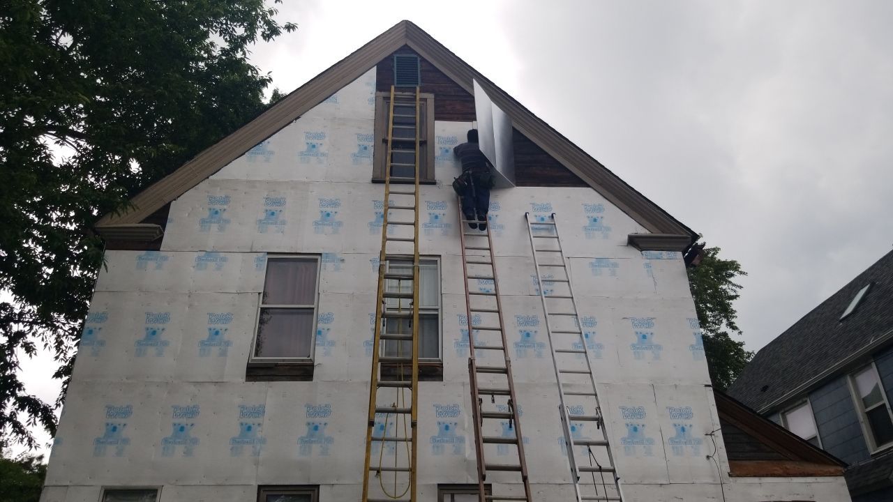 James Hardie Siding on Antique Home by Absolute Roofing and Construction